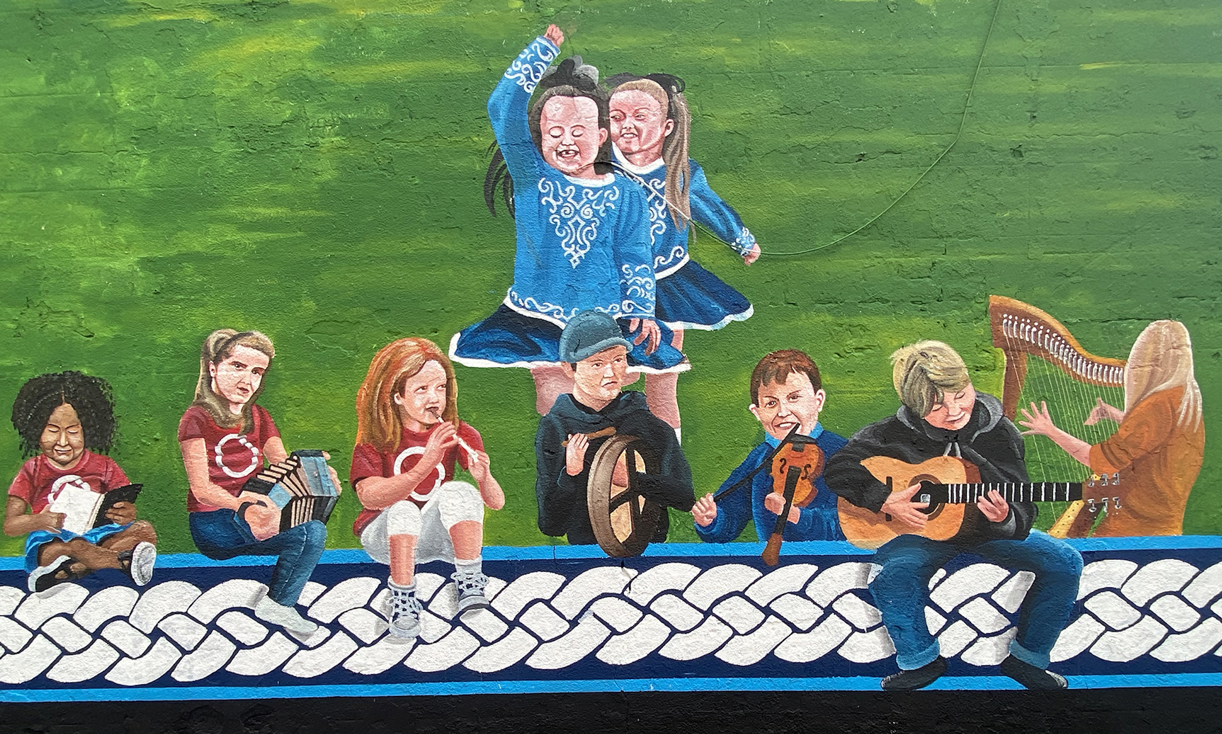 Traditional music and Irish dancing bring the wall to life