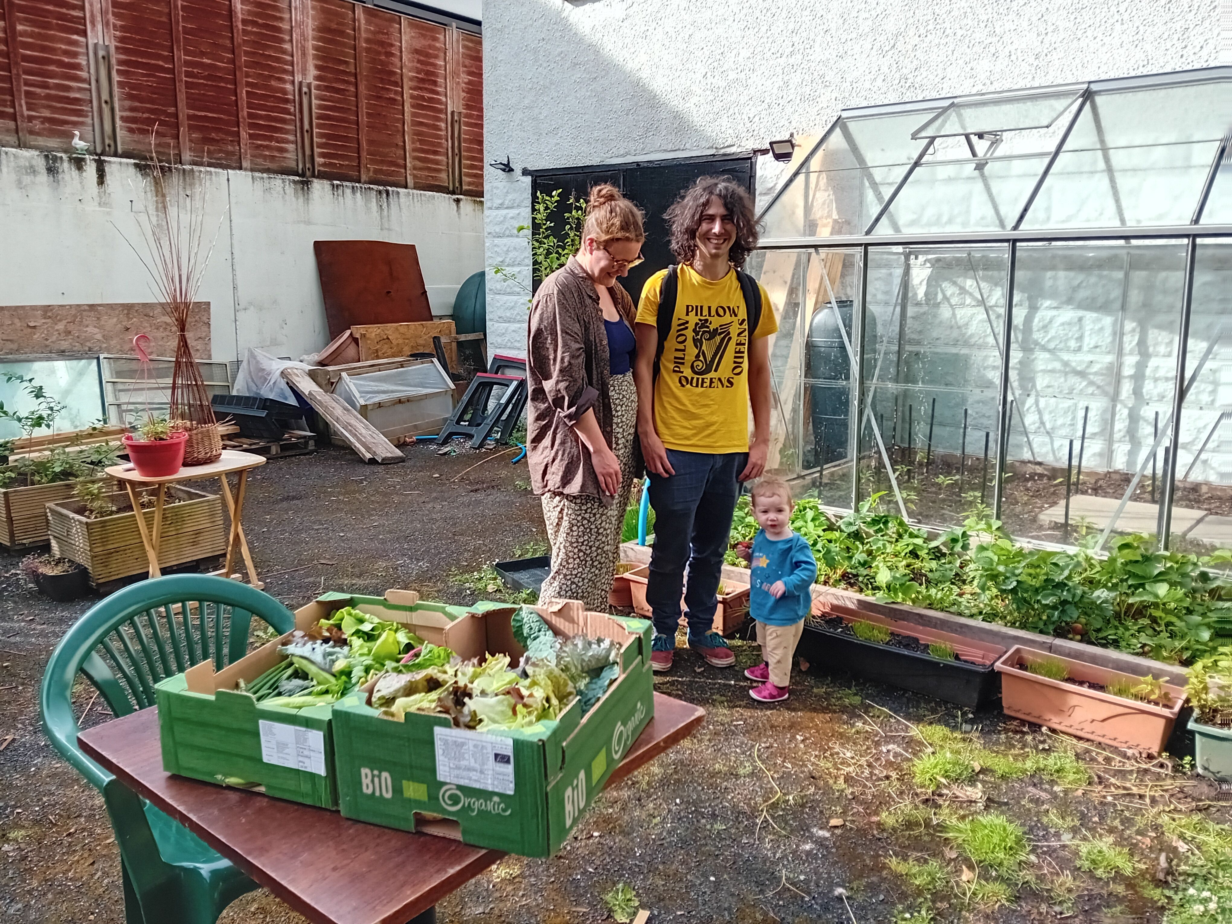 FAMILY AFFAIR: Banba enjoys her strawberries as mum and dad Roisin and Conor look on