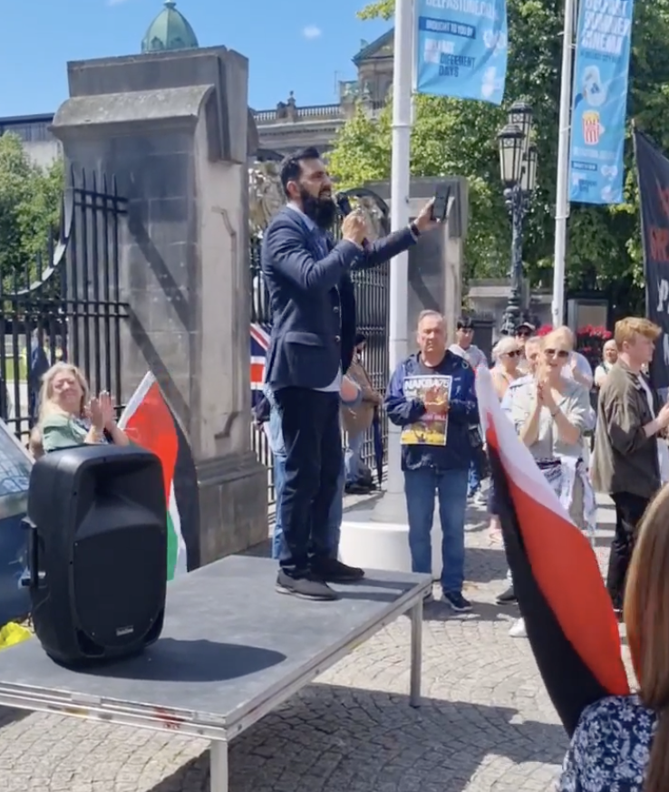 SOLIDARITY: Ali Khan of Belfast Multi-Cultural Society addresses the crowd SOLIDARITY: Ali Khan of Belfast Multi-Cultural Society addresses the crowd