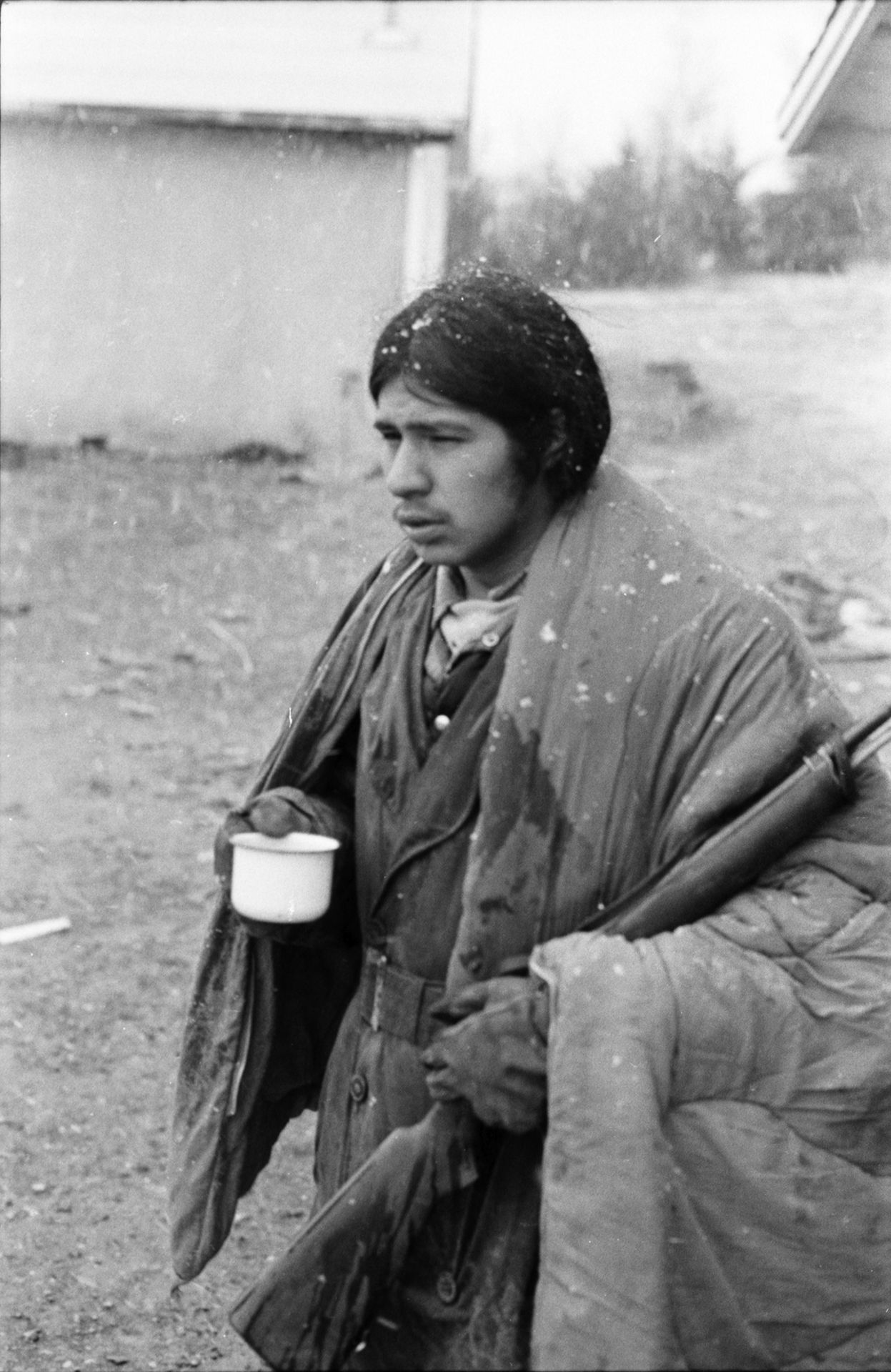 BREATHER: Taking a break from frontline duty, a warrior at Wounded Knee. Pic by Kevin McKiernan