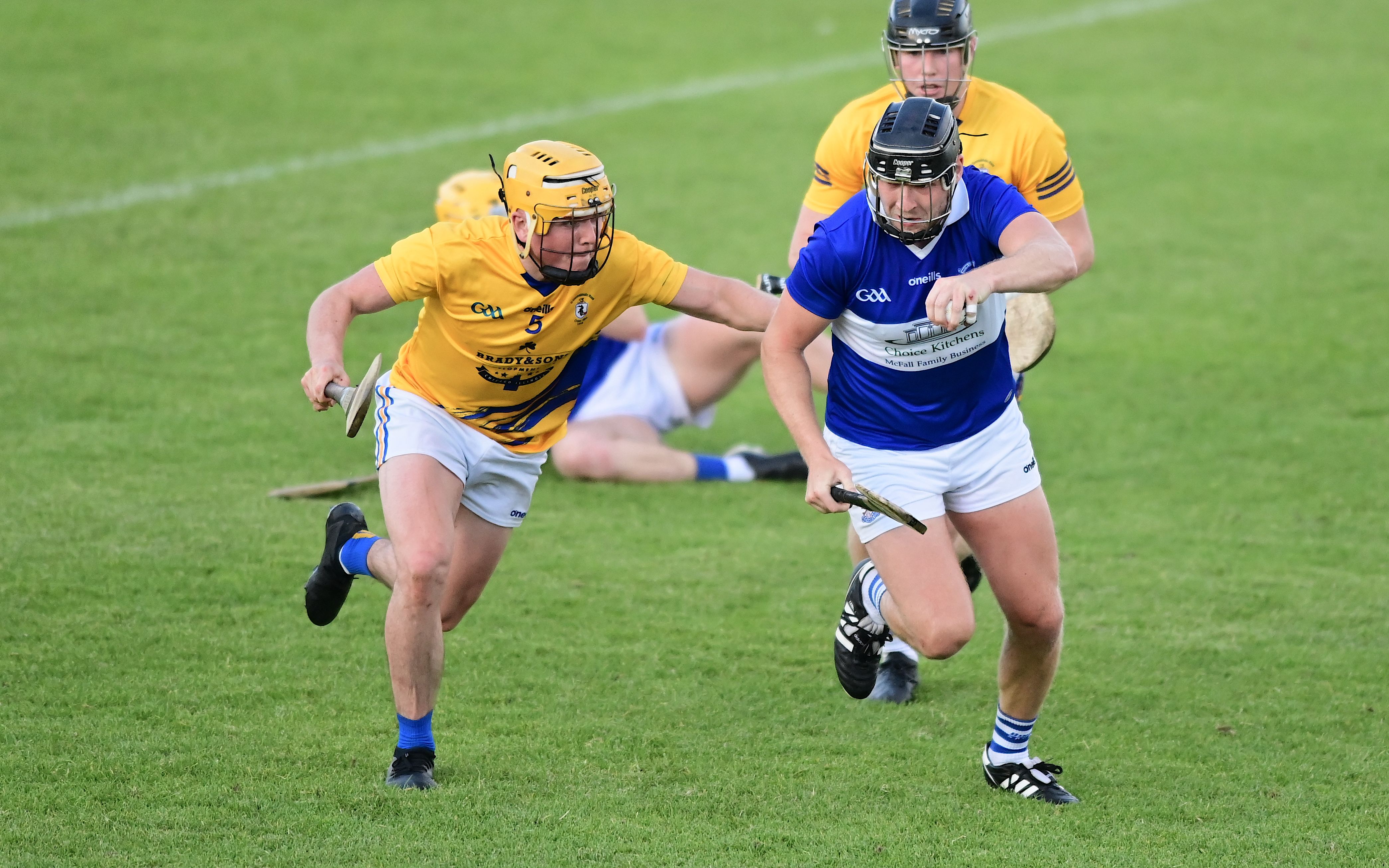Conal Morgan gets clear of Declan McCartney