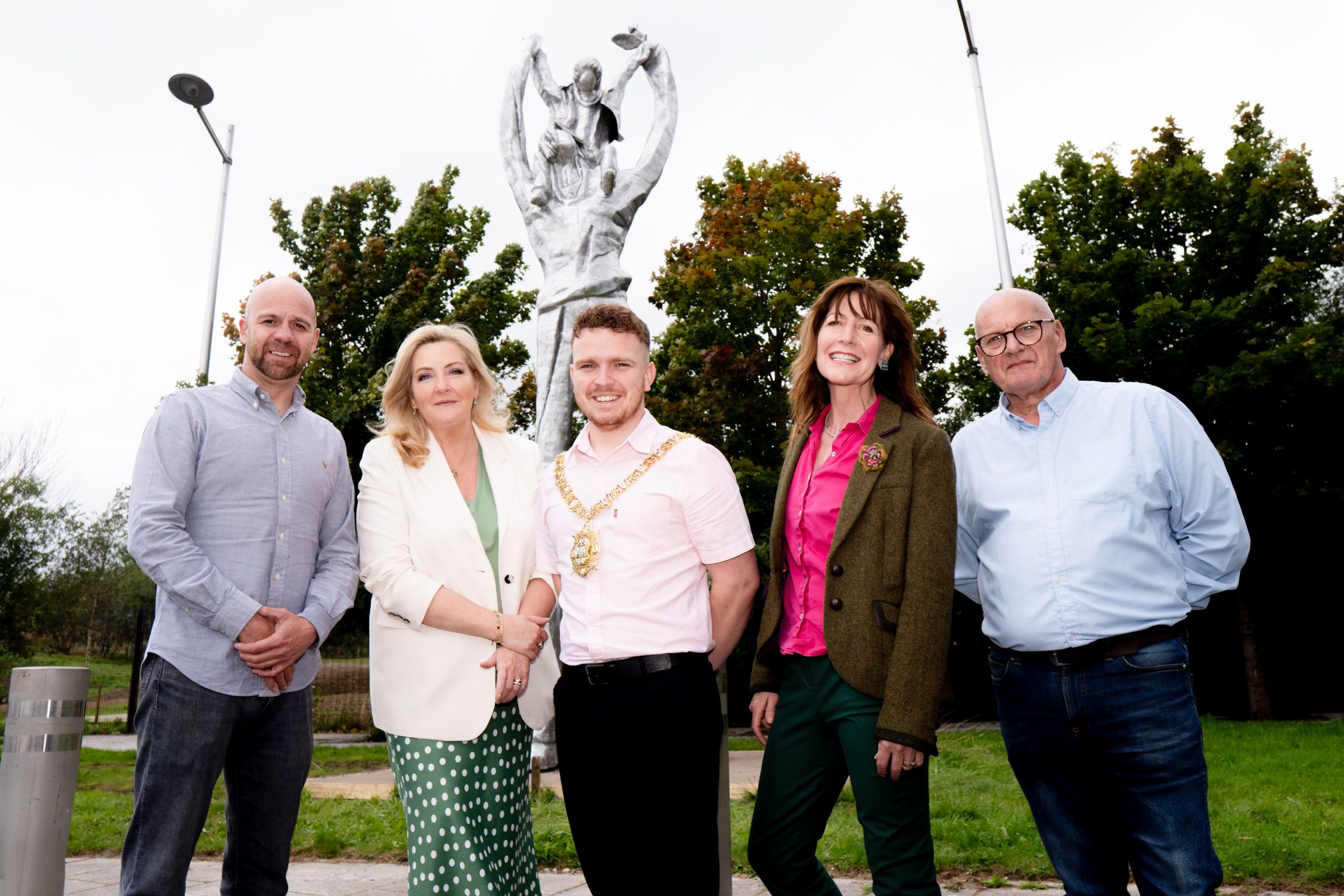 Shared City Partnership Chair Councillor Joe Duffy, Gina McIntyre from SEUPB, Belfast Lord Mayor Councillor Ryan Murphy, artist Sara Cunningham-Bell and Shared City Partnership Deputy Chair Councillor Ian McLaughlin