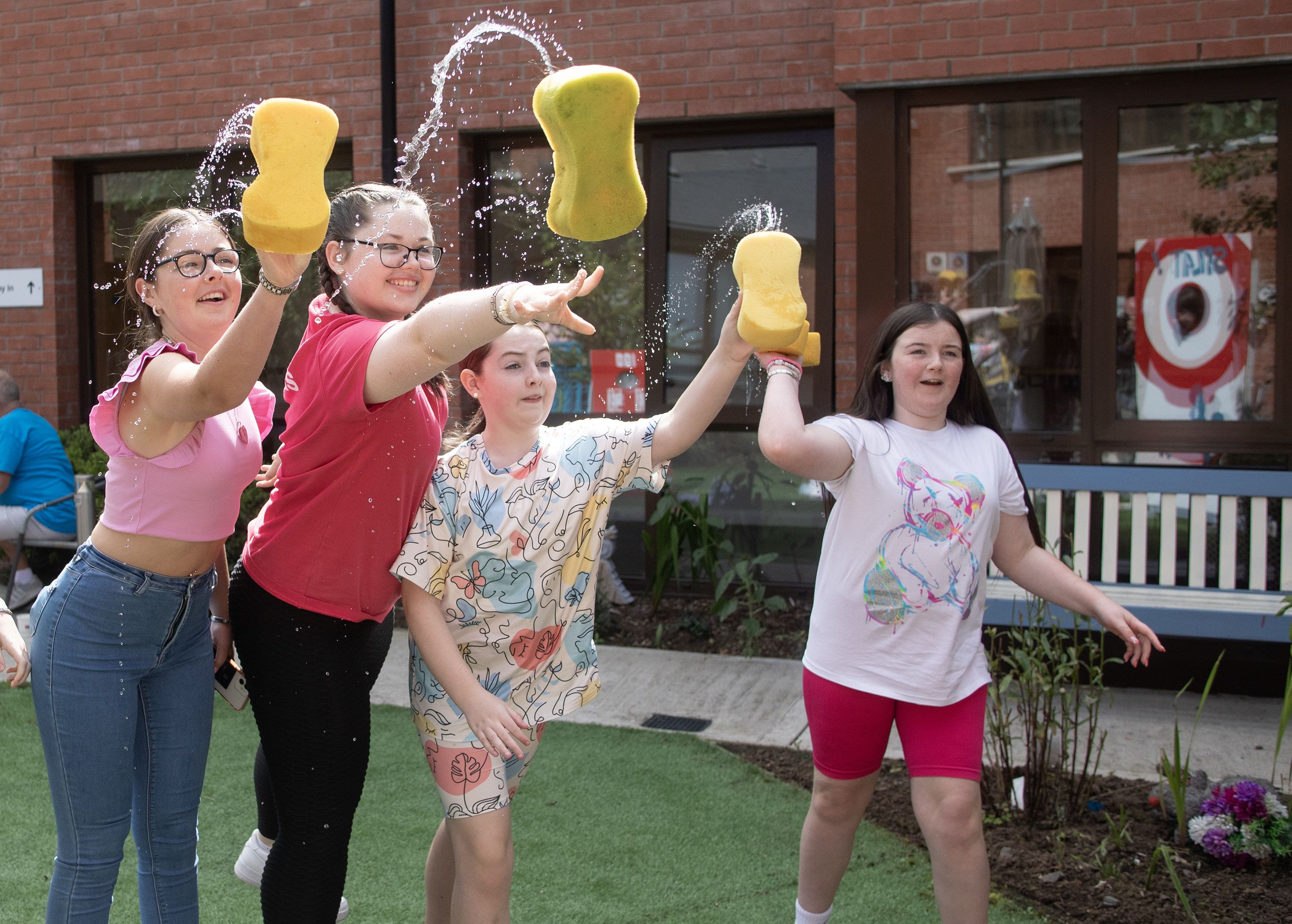 SPLASH: Local children throwing sponges as part of the fun day