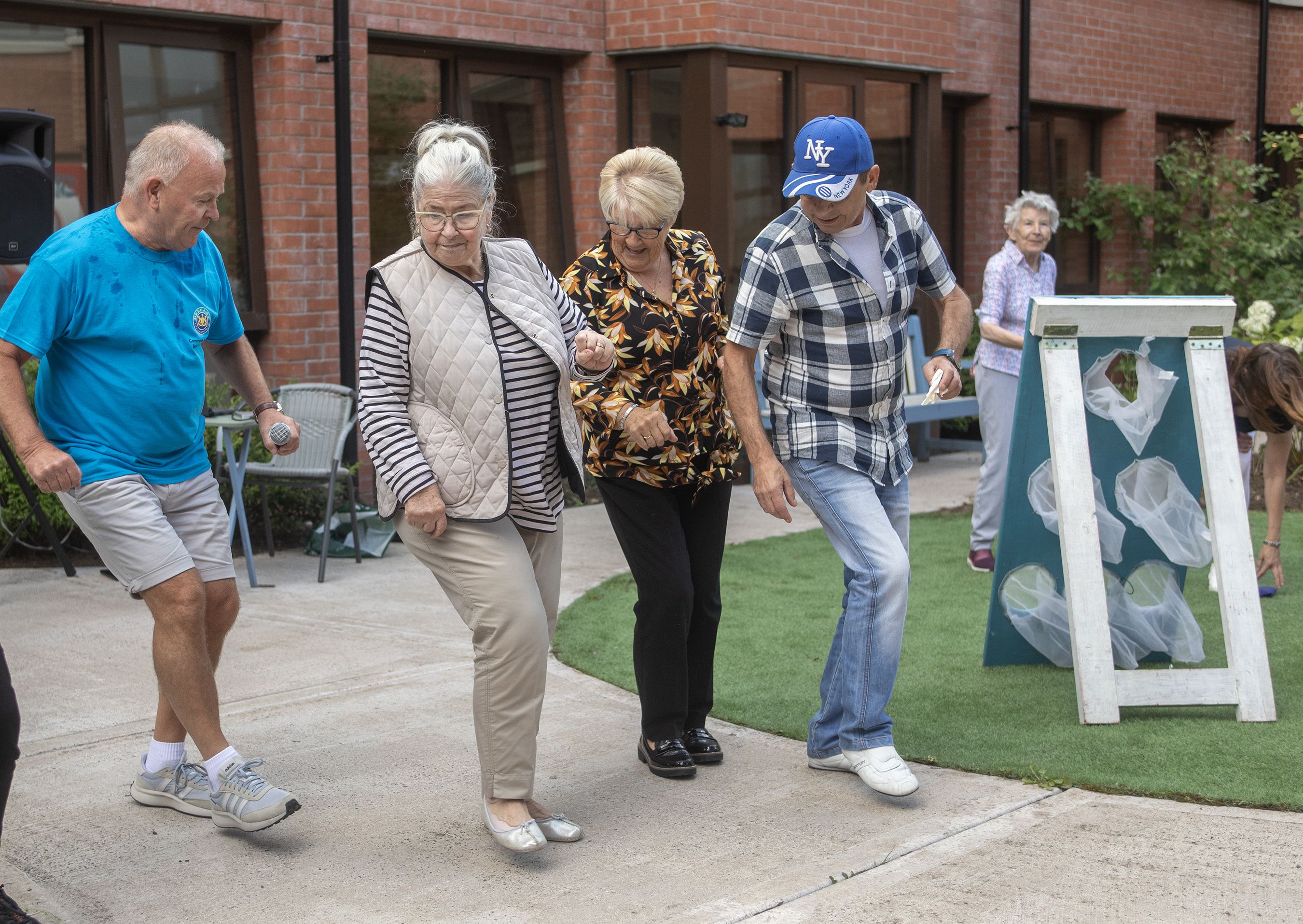 BEST FOOT FORWARD: Residents taking part in a bit of dancing during the fun day