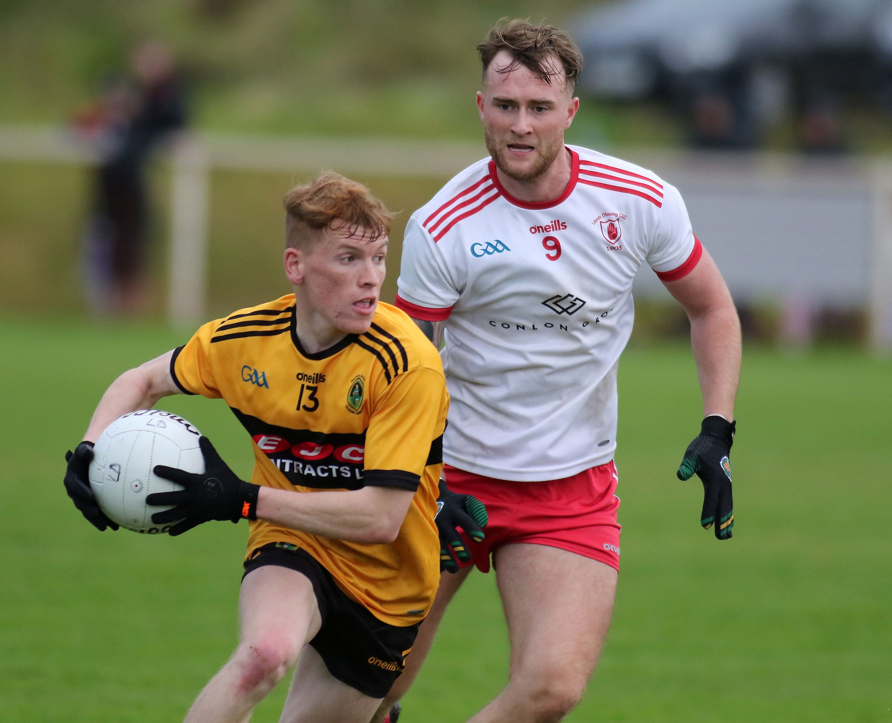 Eoghan O'Hare gets out in front of Pearse Fitzsimons