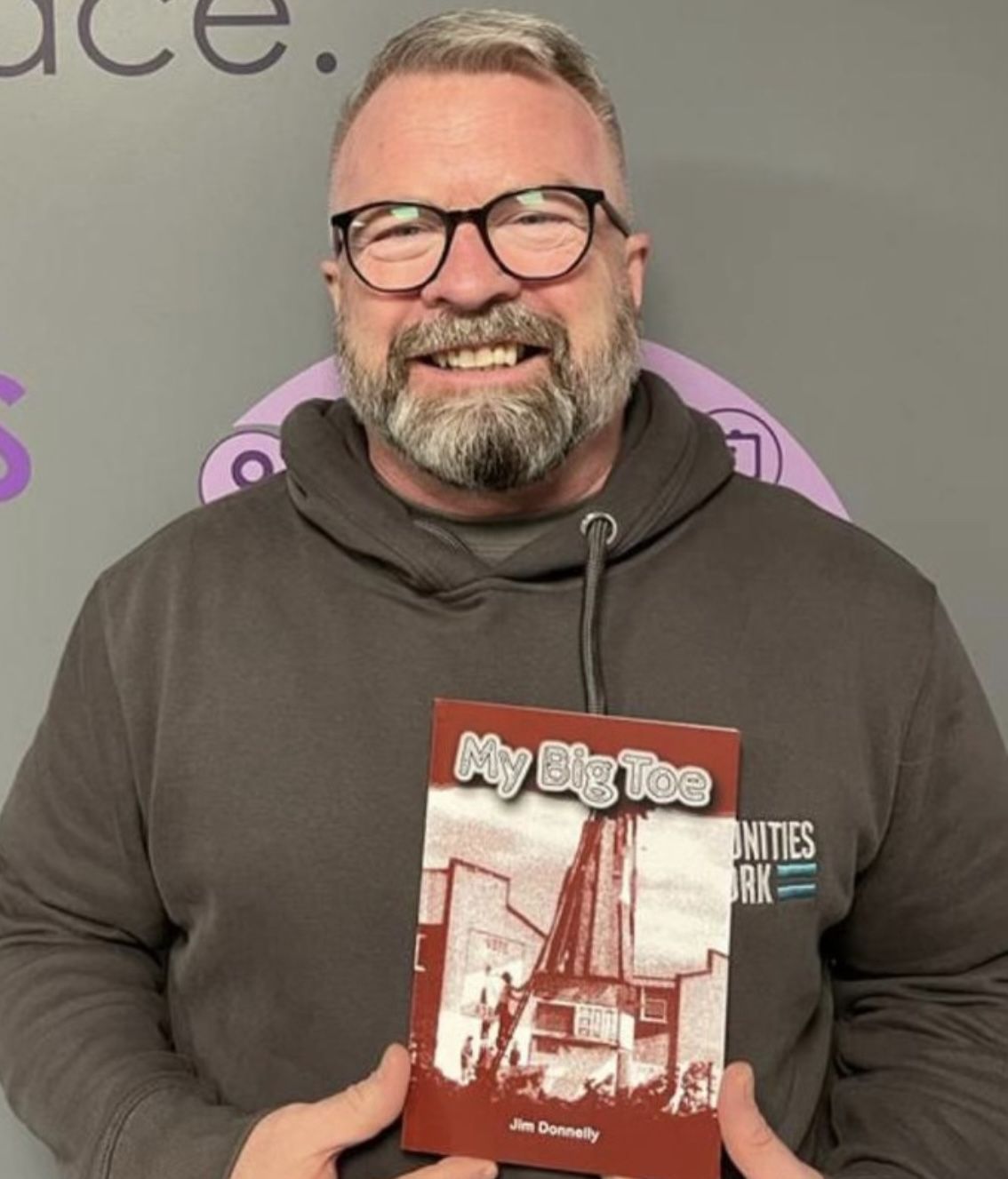 NEW DIRECTION: Jim Donnelly with a copy of his new book