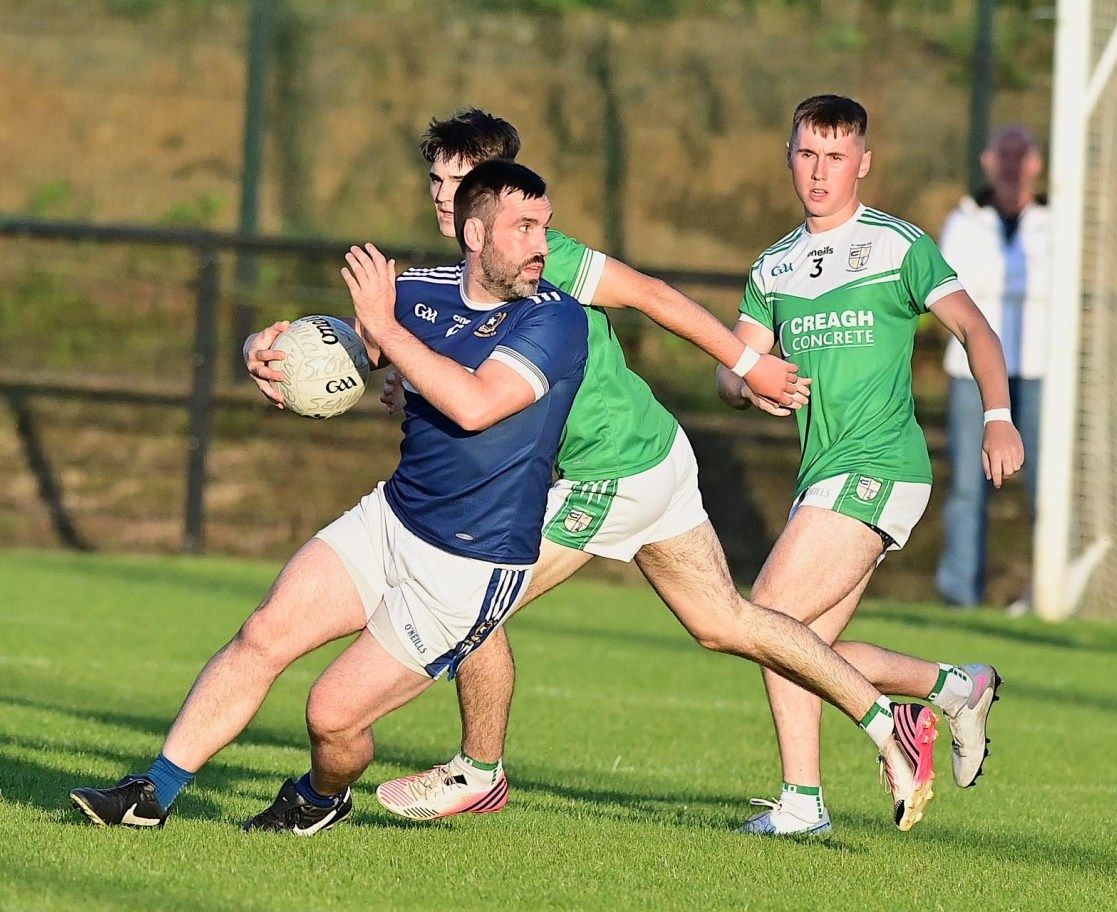 Kevin Niblock looks for a pass