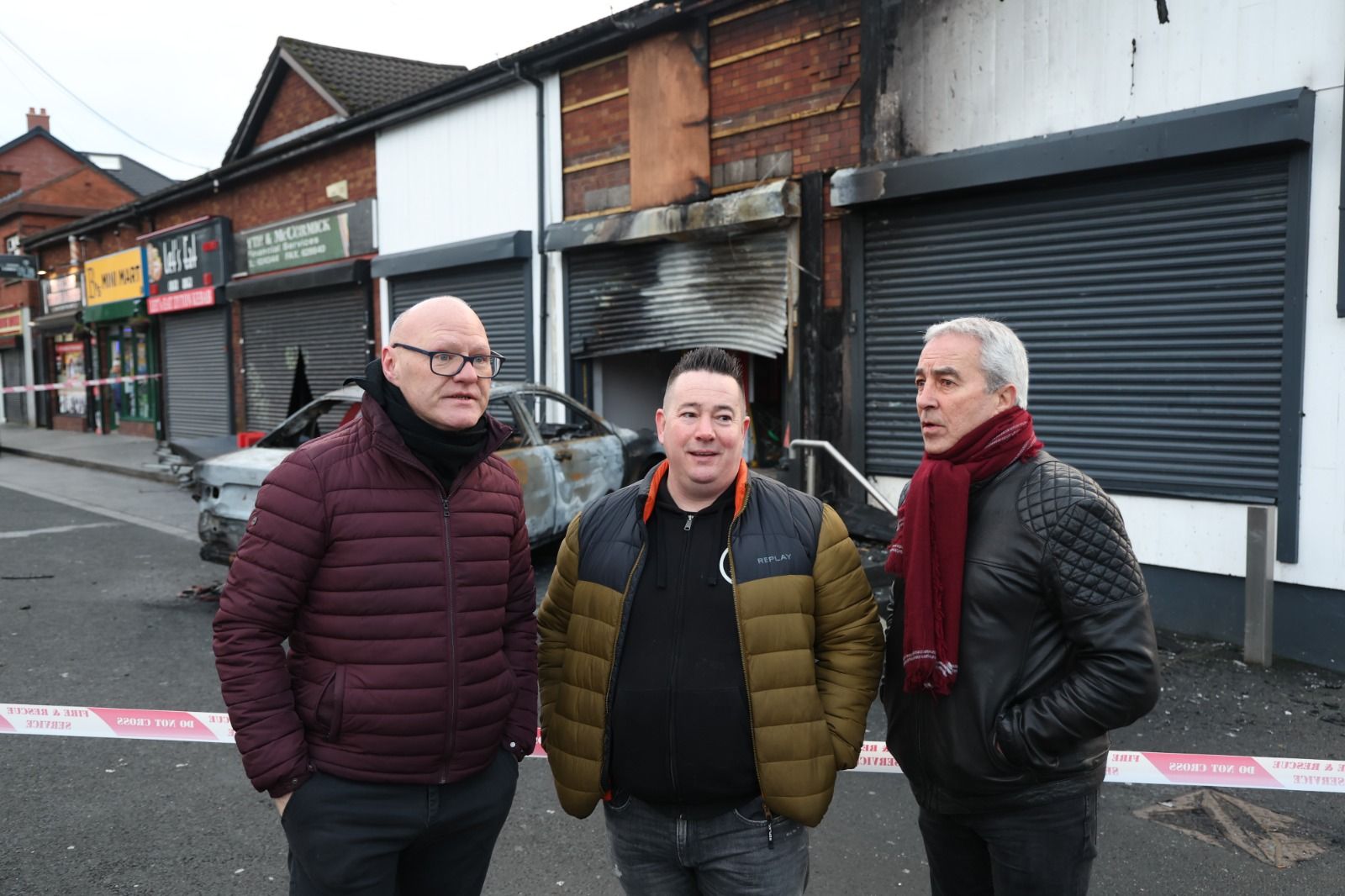 Pizza Guys owner Ciaran Kelly with Paul Maskey MP and Pat Sheehan MLA