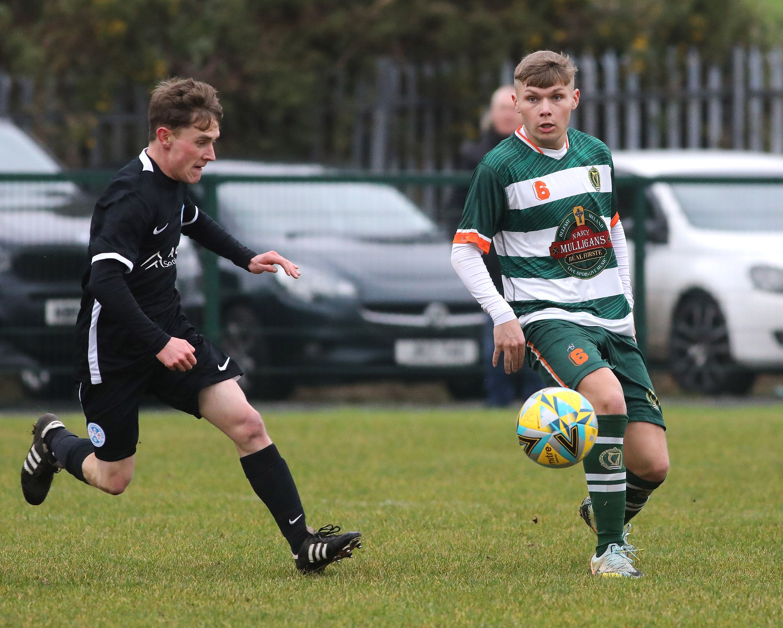 Niall Dixon looks for a pass