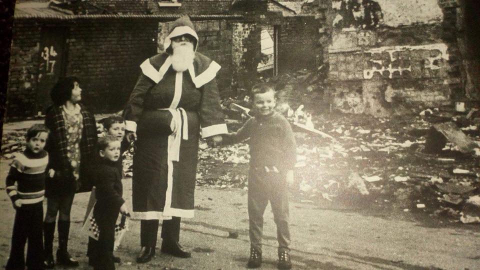 HISTORY: Santa visits some local kids amidst the rubble in Clonard FESTIVE: Santa visits some local kids amidst the rubble in Clonard