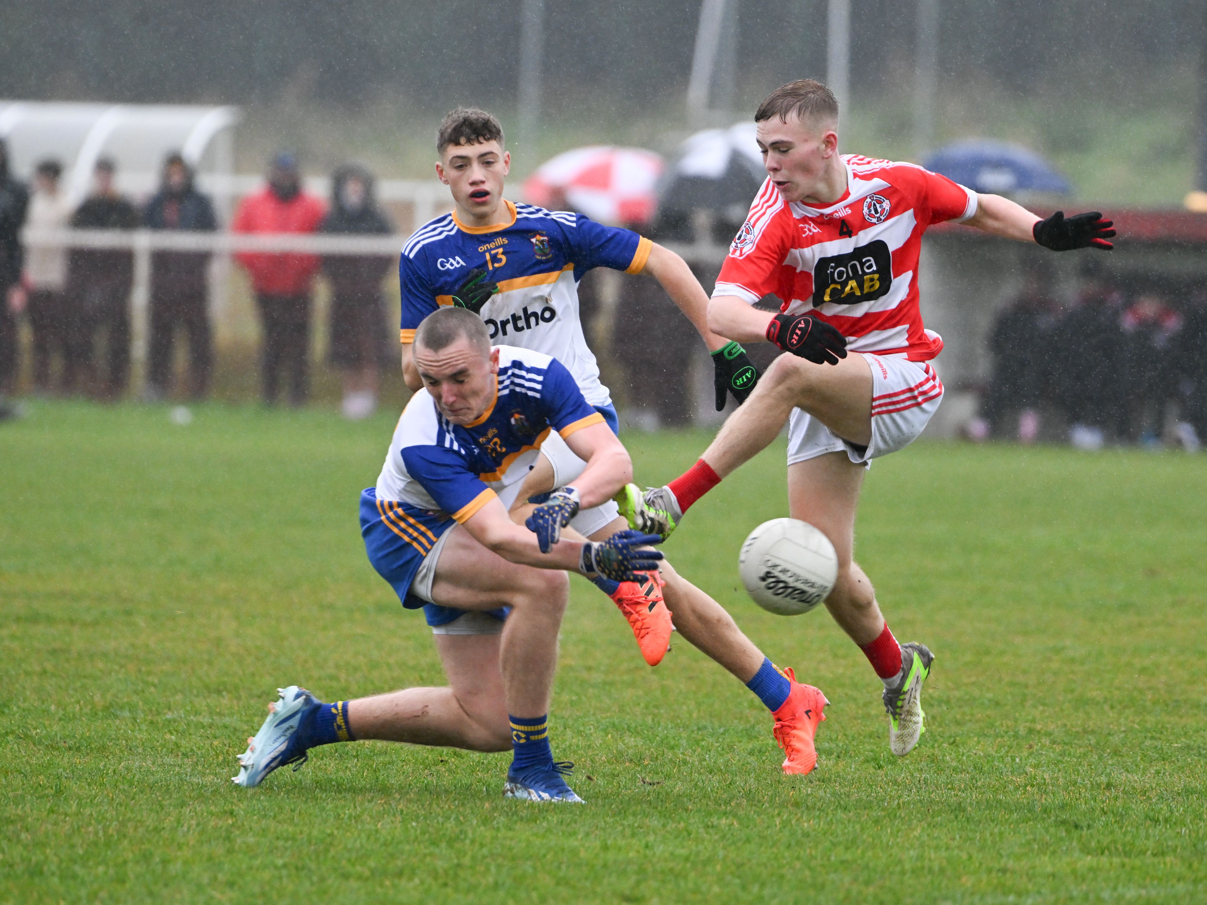 Peter Molloy gets down to block a Garrett Cowan clearance 