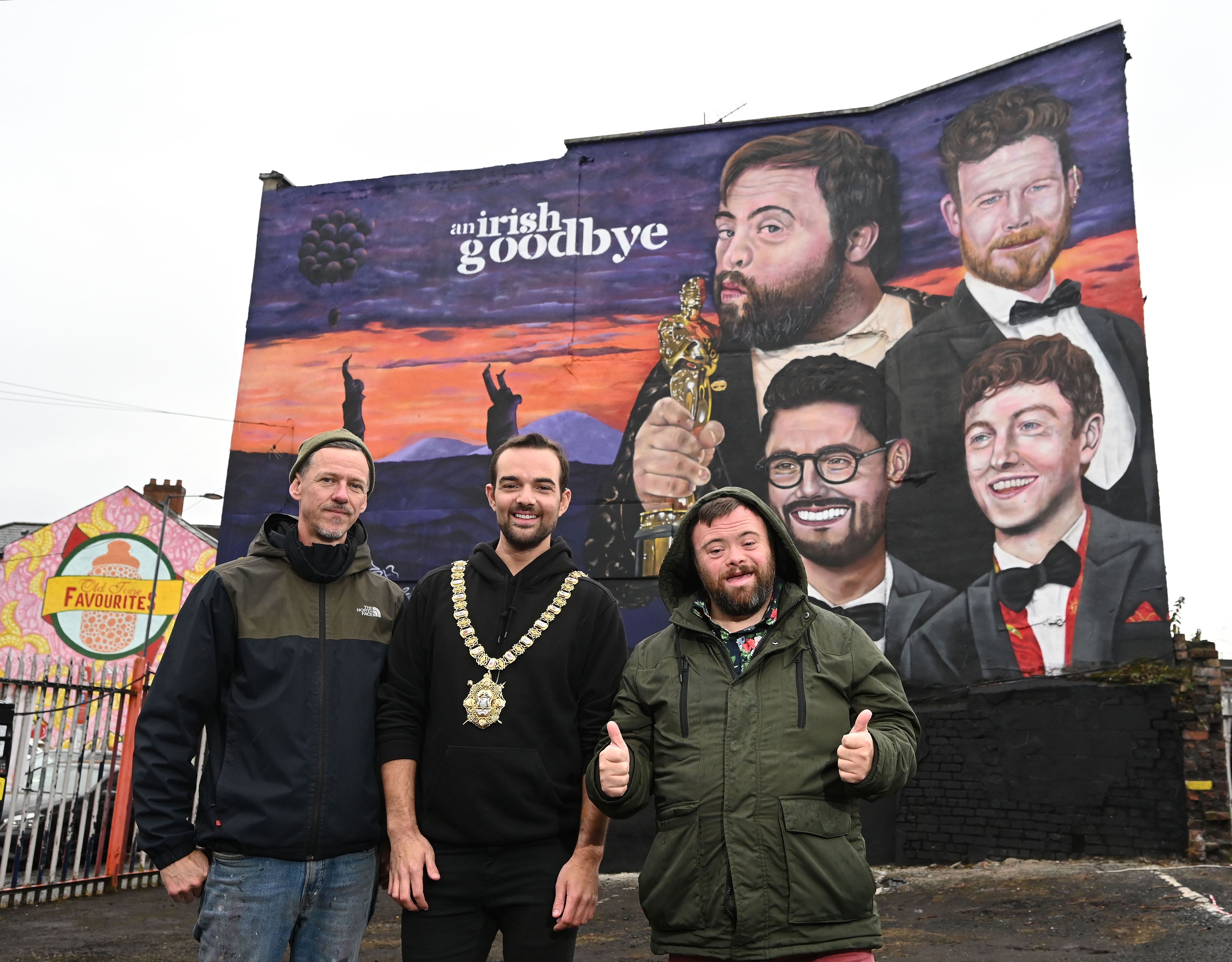 Lord Mayor of Belfast, Councillor Micky Murray, joins members of street art collective Peaball and the cast and crew of An Irish Goodbye at the unveiling of a new mural in Belfast city centre, celebrating the Oscar-winning short film