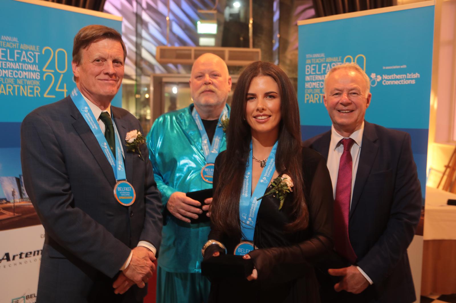 IN FRAME: Attorney Mike Carroll of New York, artist Rodney Dickson and Harley Semple of Options IT in the Big Apple were presented with their Ambassador medals by John Walsh, CEO of Belfast City Council