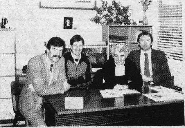 Three members of St Galls team Gerry Moore, Sean McGourty and Joe Diamond discuss tactics for Sunday’s Ulster Club Final replay with school principal Bro Dominic, who is also the club president