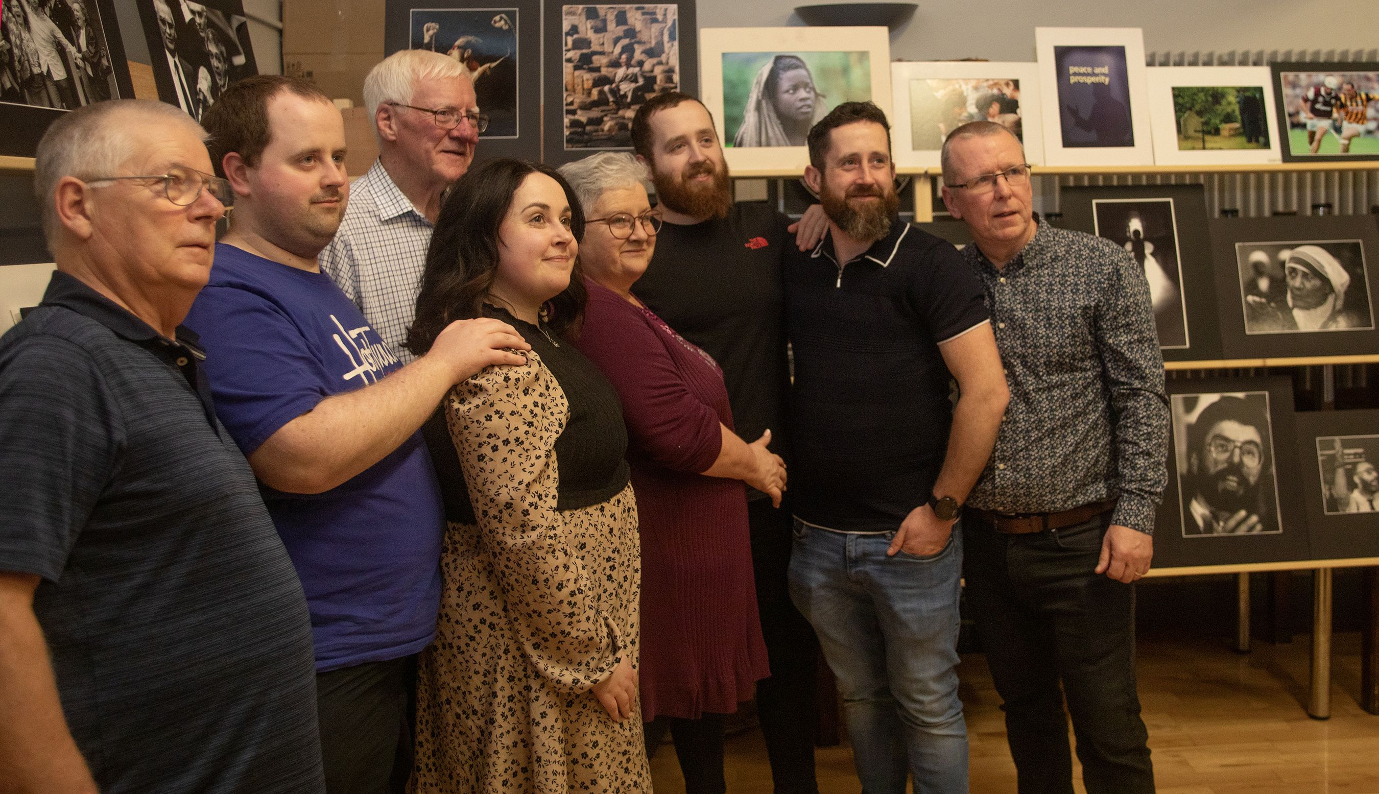 Malachy Connolly, John McCann and Gary Johnston from CB Camera Club with Hugh's wife Cathy and family.