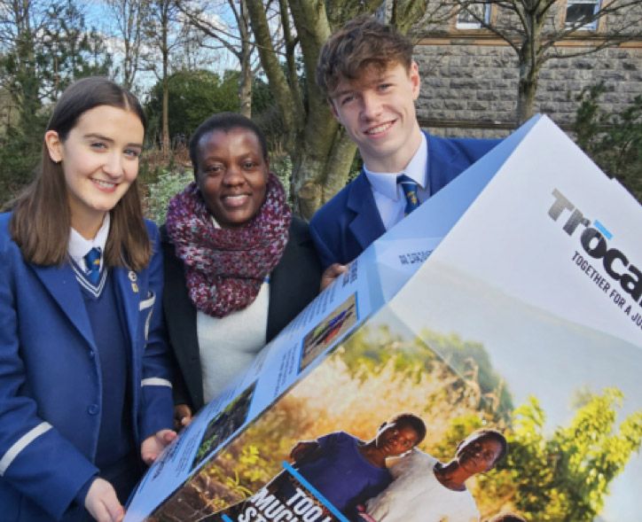Salome Mumba with Rathmore Grammar School Head Girl Kate McKenna and Head Boy Rory McErlean