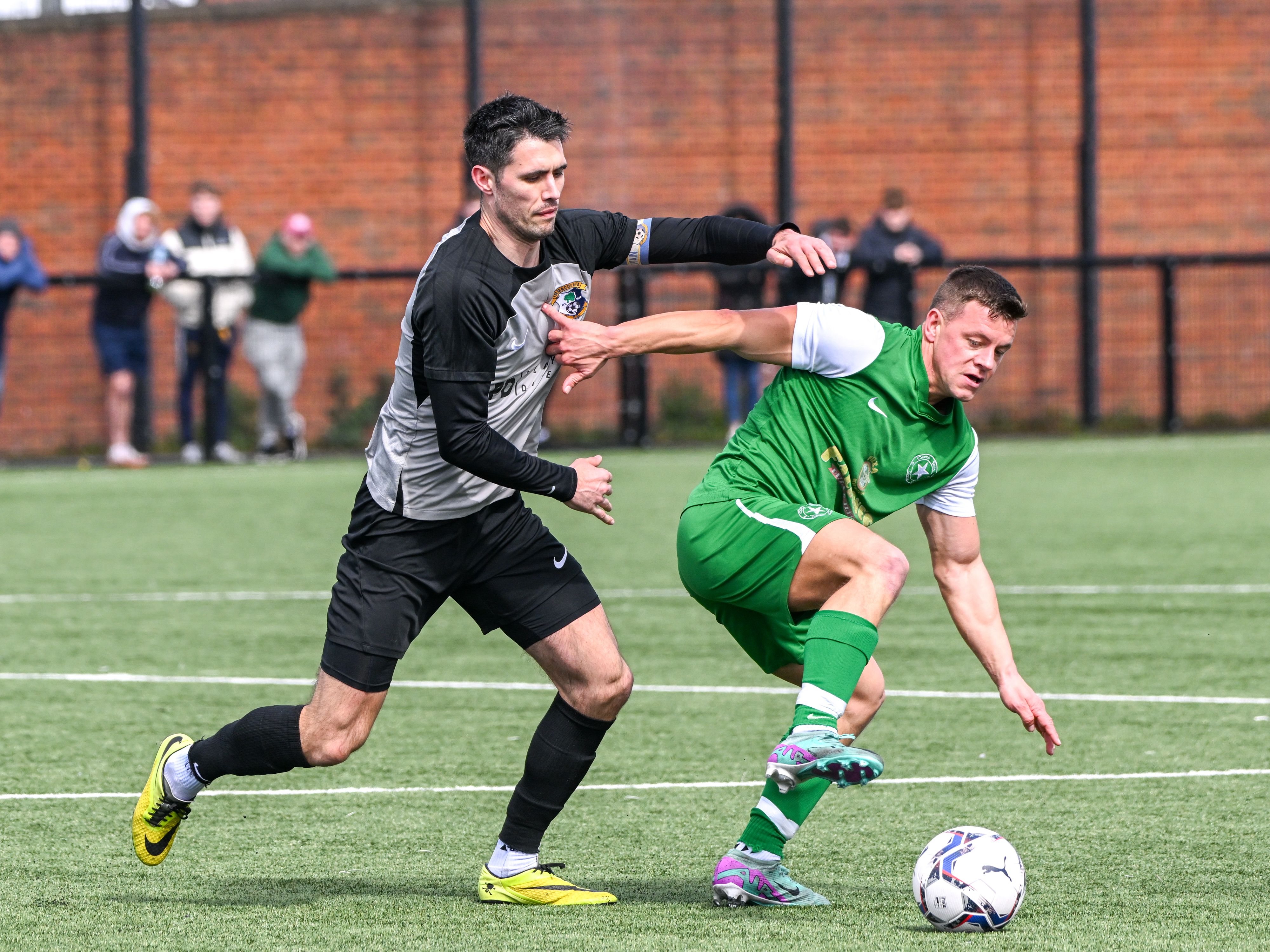 James Doyle gets in front of Padraig Adams 