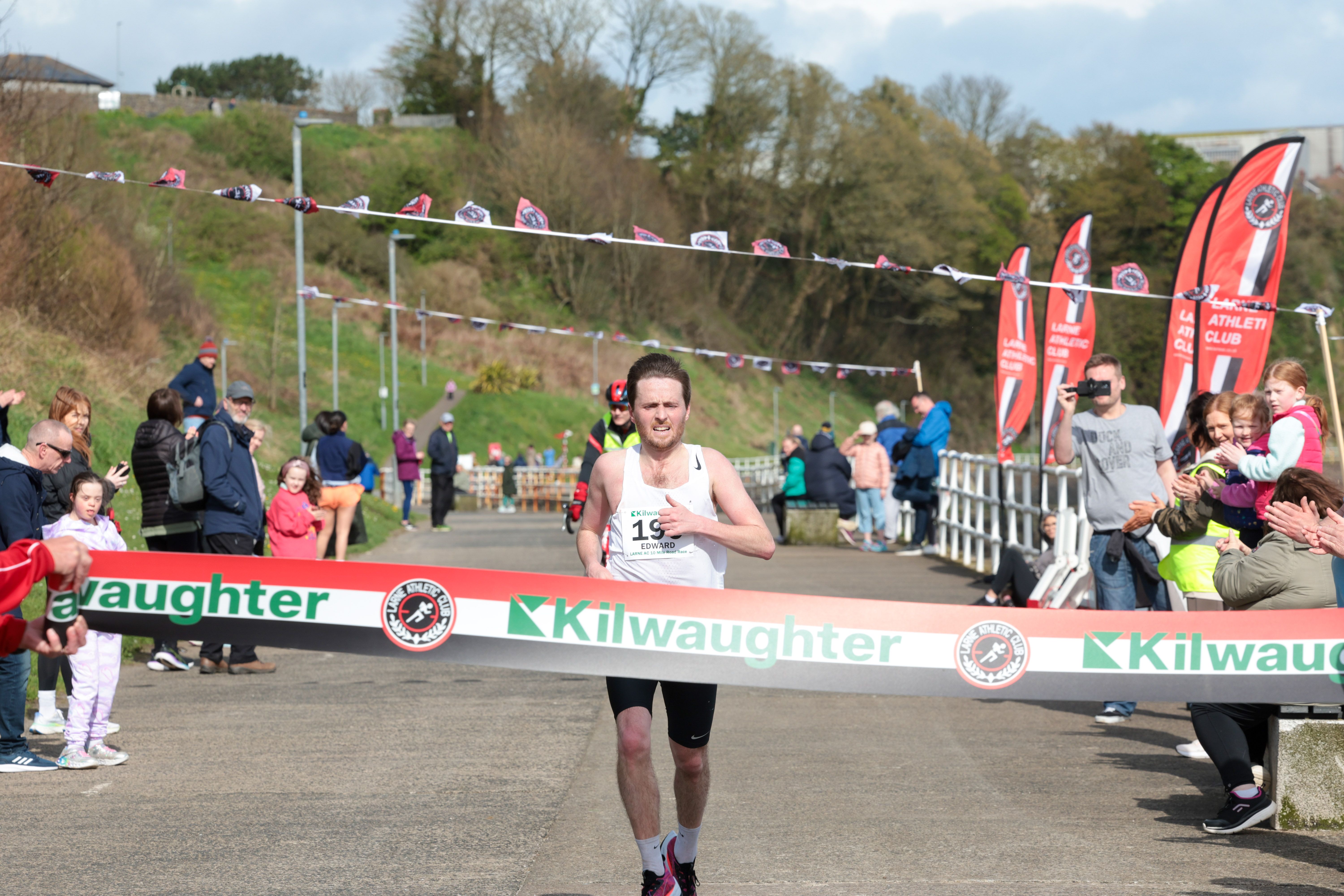 McGinley crosses the line in first place