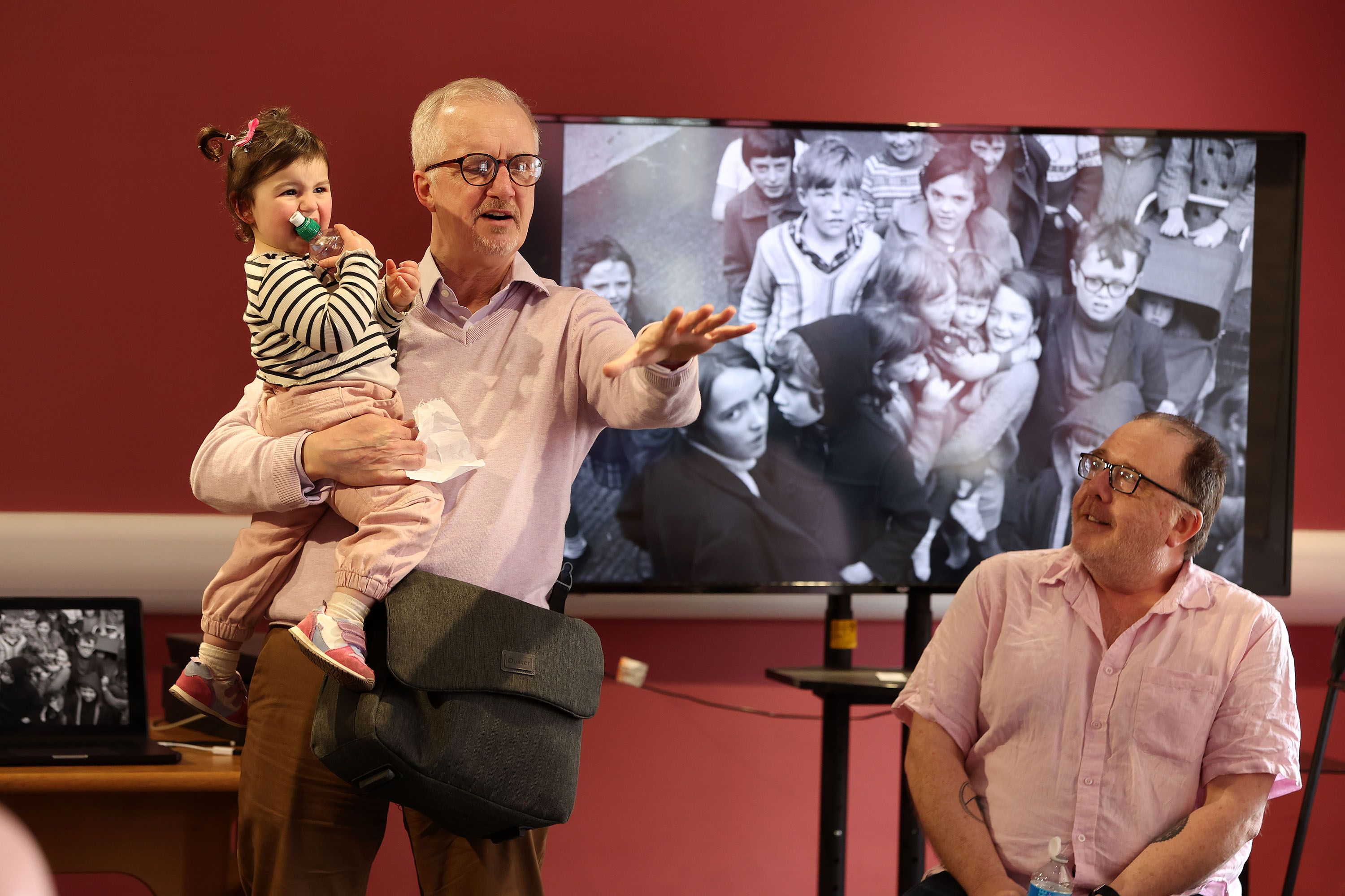 GENERATIONS: Robin Livingstone speaking at the launch with organiser Frankie Quinn; also pictured is Robin's granddaughter, Cecília Livingstone Moita