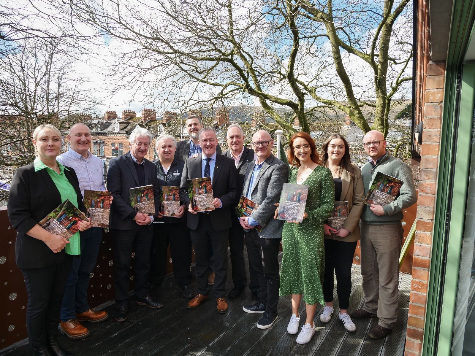 DRIVE FOR FIVE: Guests and workers at Áras Uí Chonghaile gathered for its fifth birthday party last Friday