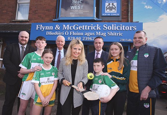 SPONSOR: Gavin Shaw and young members of Davitt's GAC with solicitors from Flynn & McGettrick