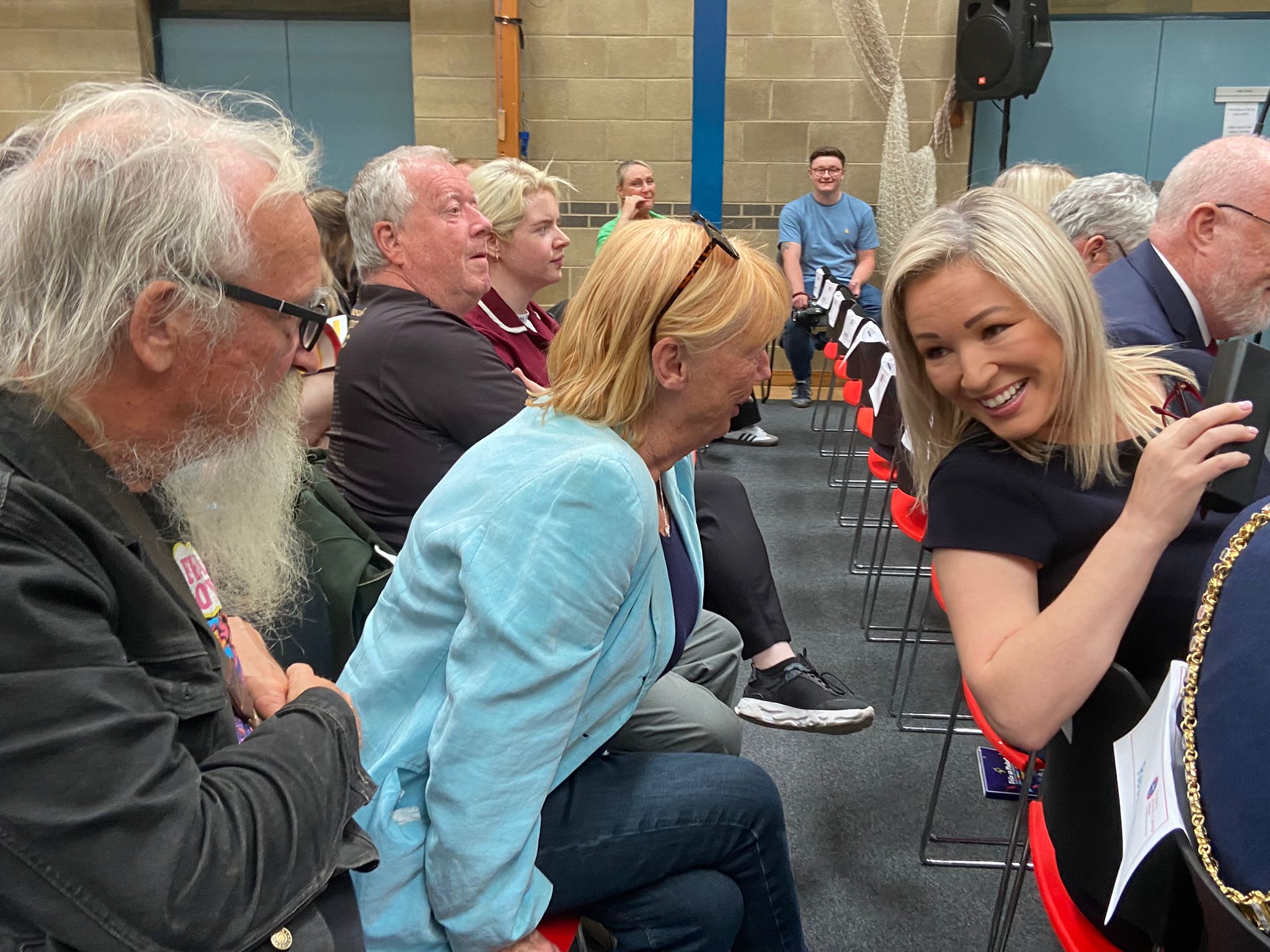 Michelle O'Neill has a catch-up during the launch at St Mary's University College today
