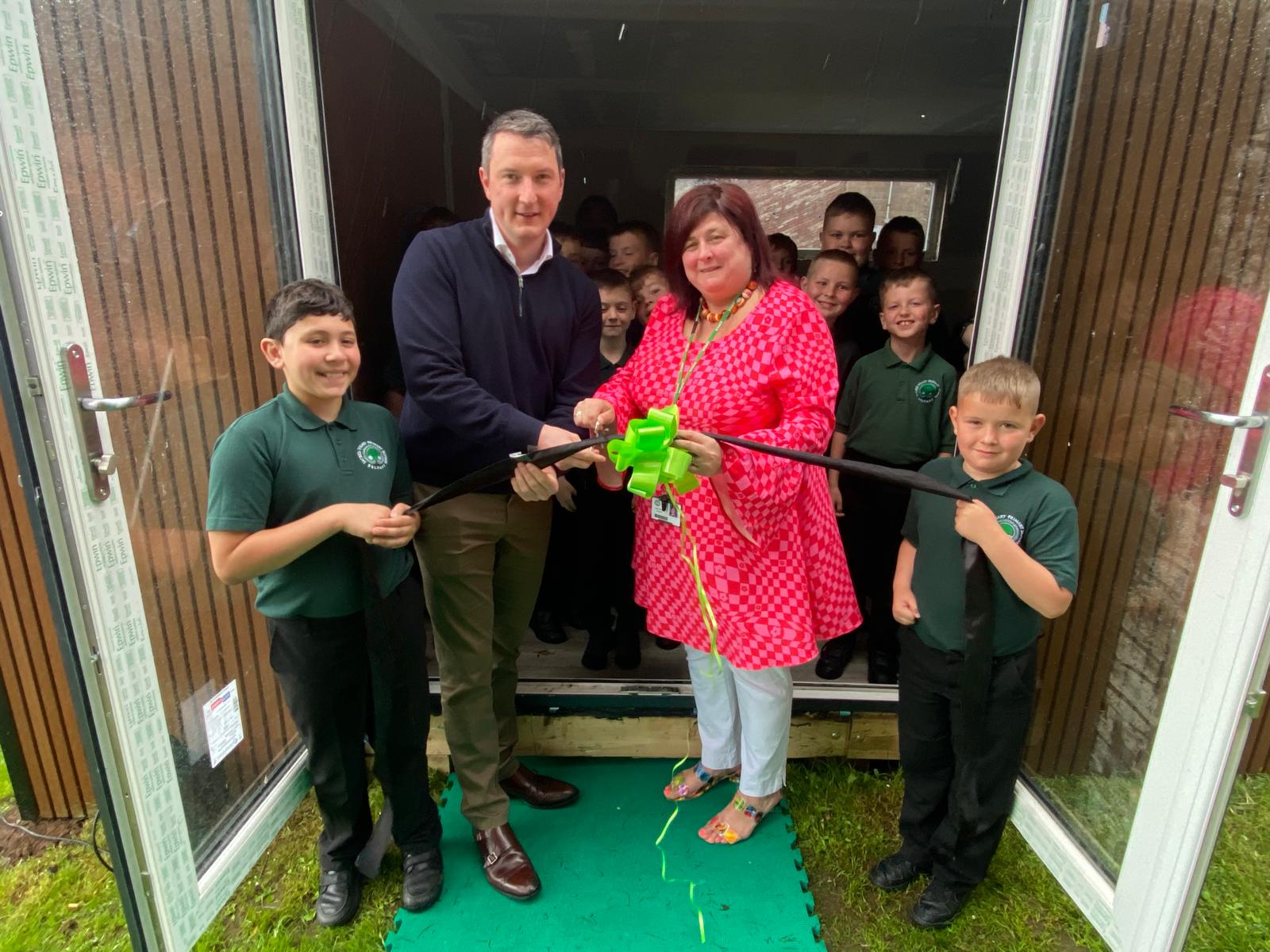 Joanne opening the new parenting pod with John Finucane