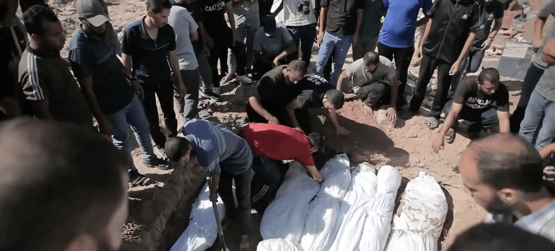 CARNAGE: Victims of the latest Israeli atrocity are buried