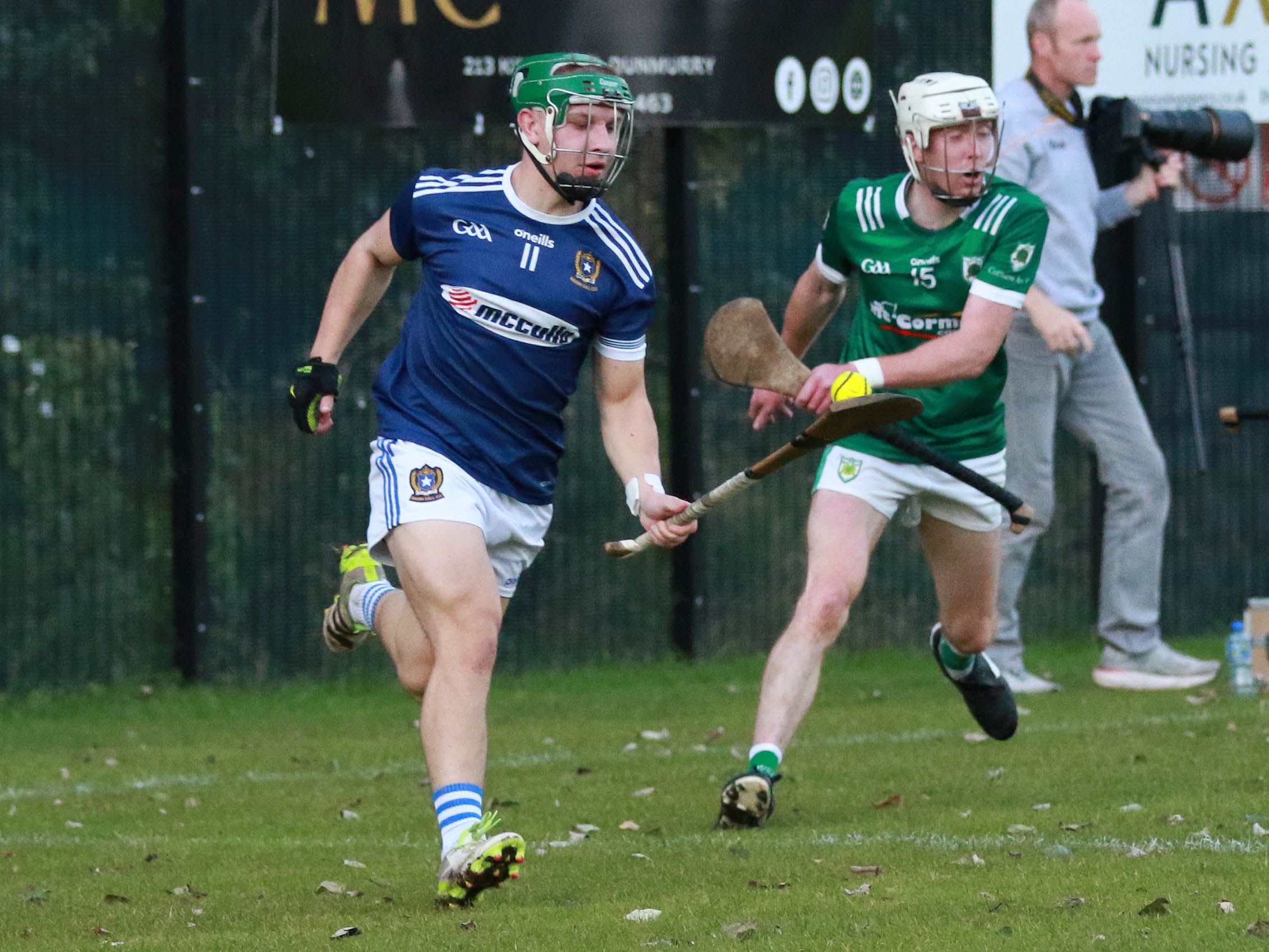Marcus Donnelly makes a run at the Carey defence 