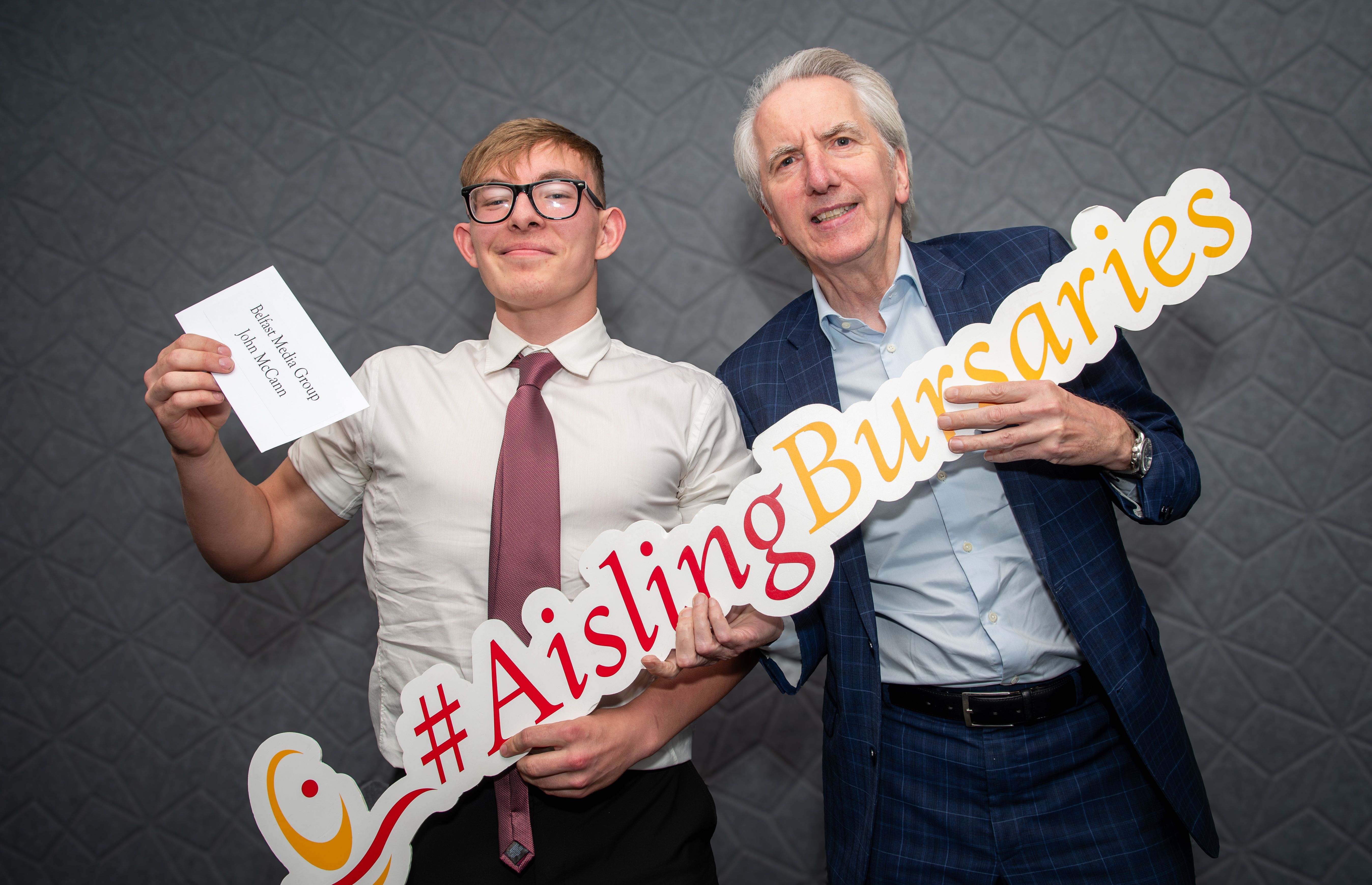 Mairtin O'Muilleoir presents the Belfast Media Bursary to recipient John McCann 