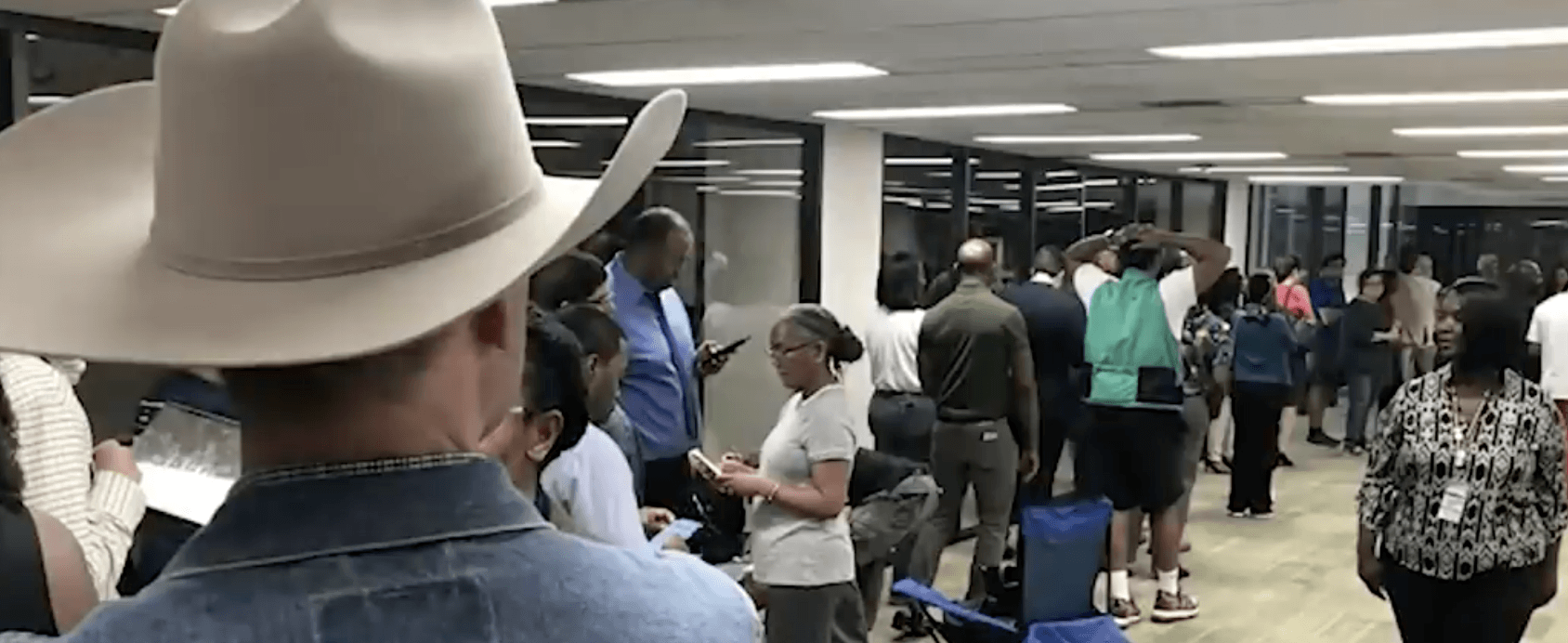 EXERCISING THE FRANCHISE: A queue – sorry, line – of Americans waiting to vote