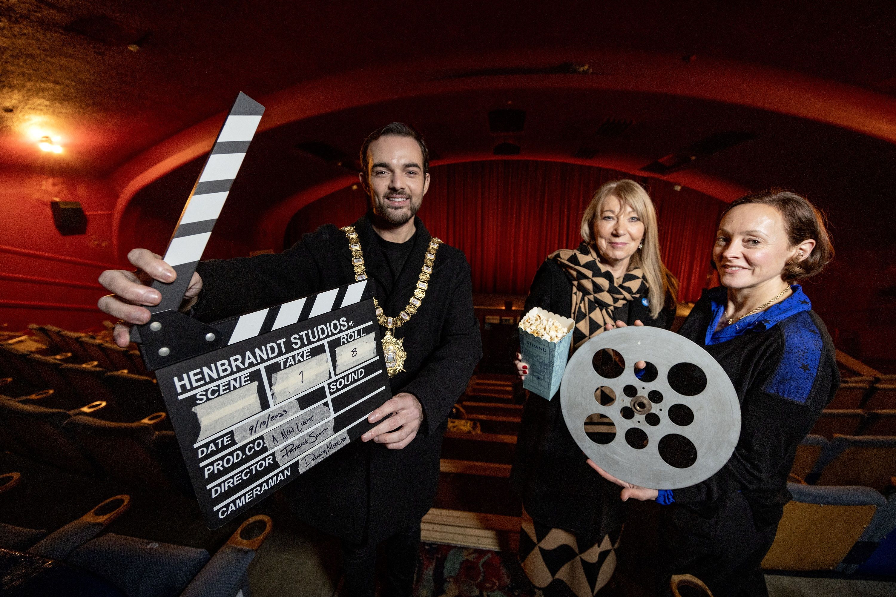 Patricia Corbett from The National Lottery Heritage Fund, Lord Mayor of Belfast, Councillor Micky Murray, and Mimi Turtle, Chief Executive of the Strand Arts Centre