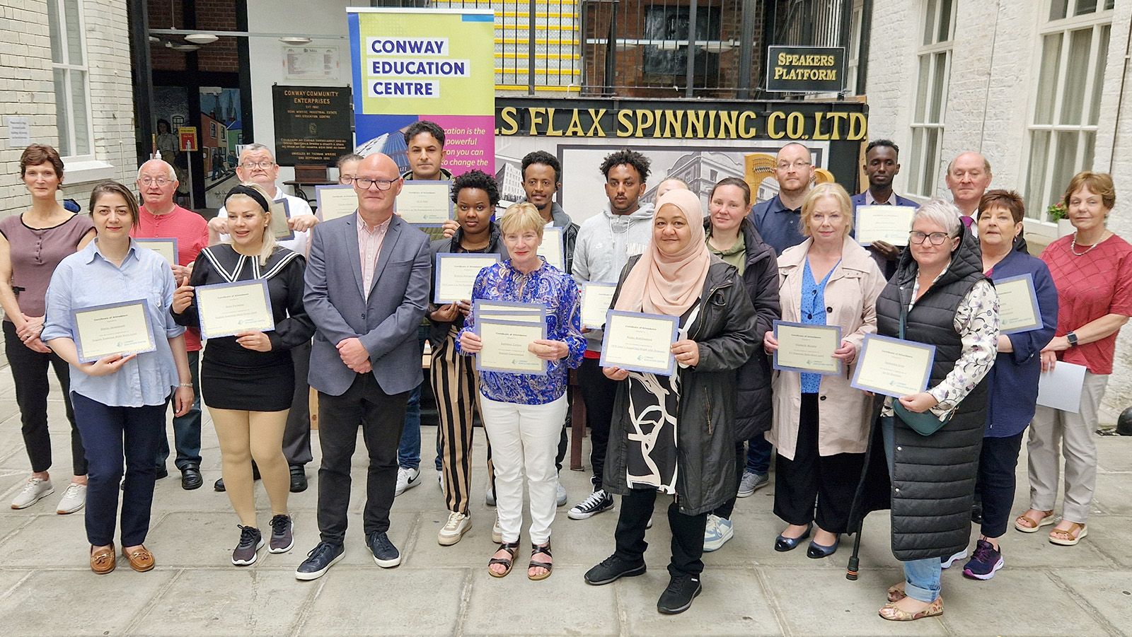 ESOL group with their certificates