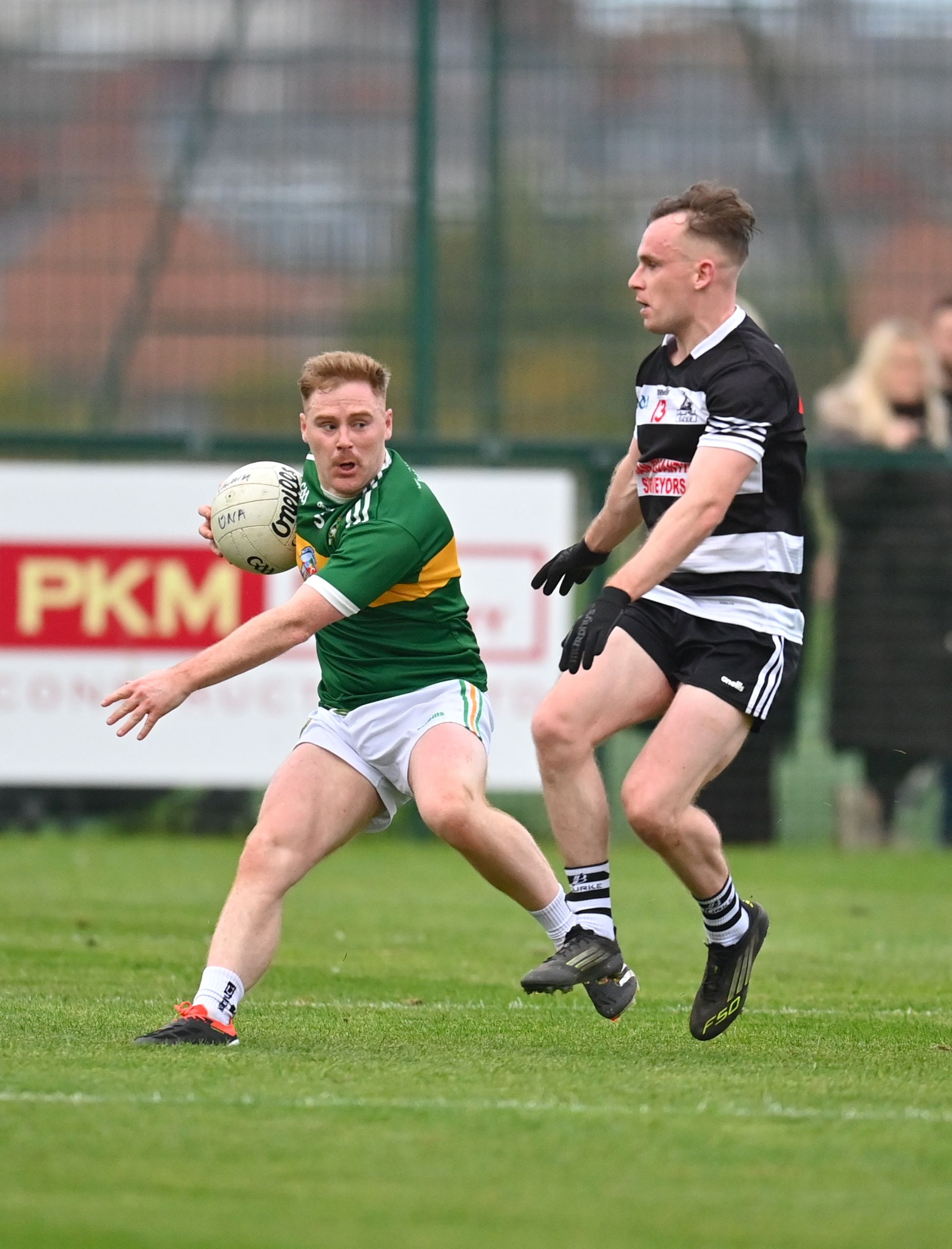 BATTLE HARDENED: Cormac Gillespie (left) and David McGaharan (right) battle for possession