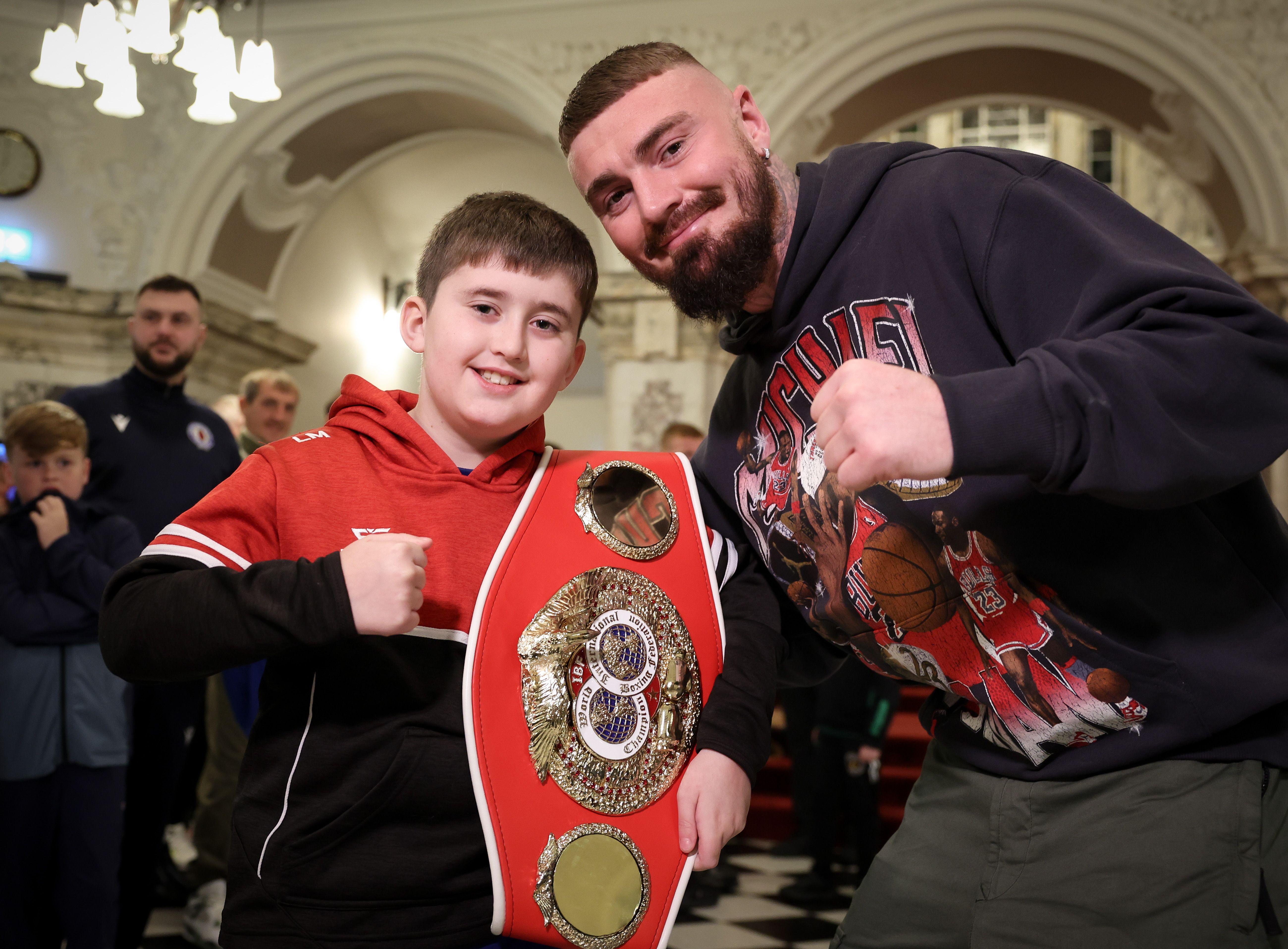 Young boxer Lewis Morrow from Cairn Lodge Boxing Club joins IBF World Welterweight Champion Lewis Crocker 