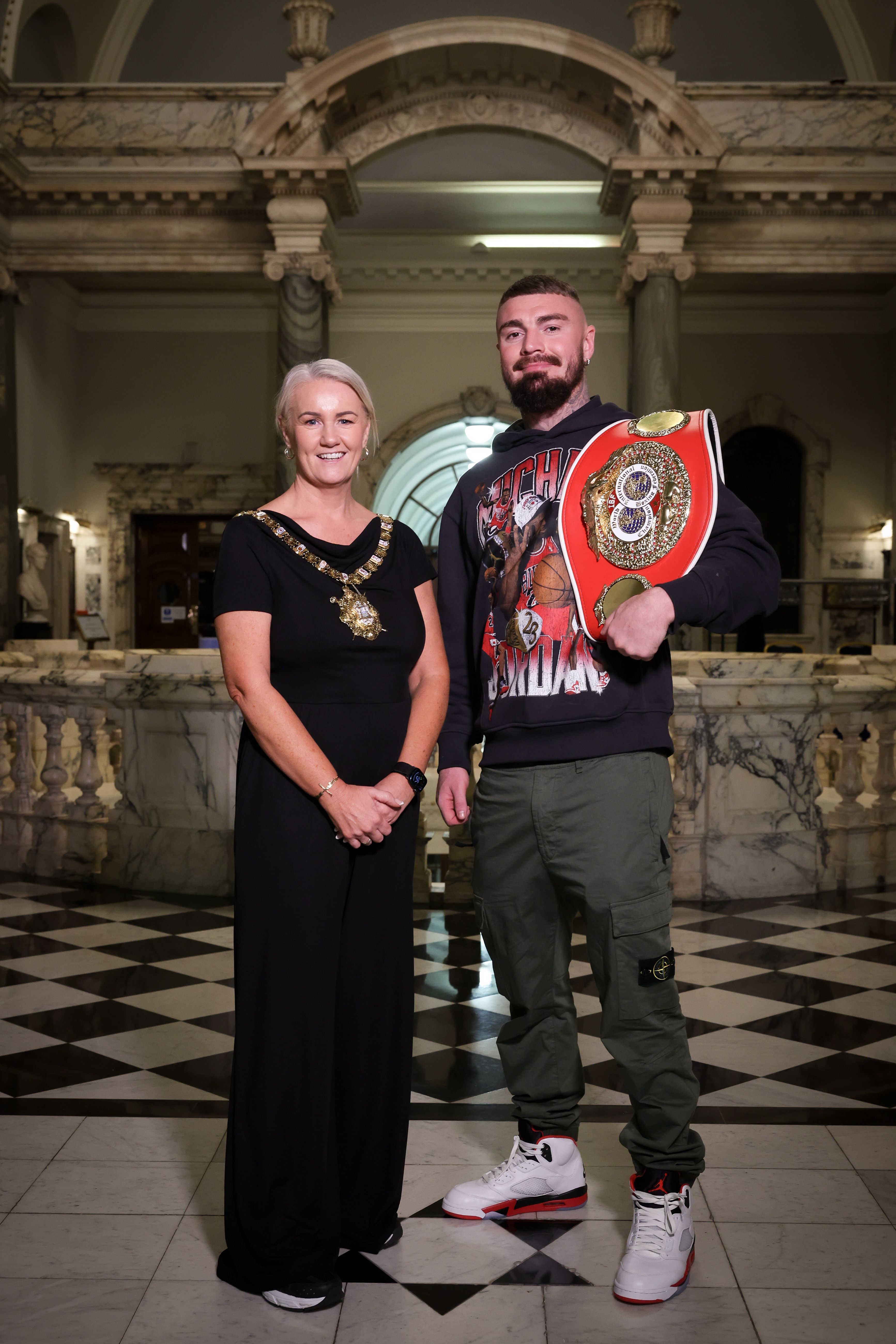 Lord Mayor of Belfast, Councillor Tracy Kelly,  with IBF World Welterweight Champion Lewis Crocker
