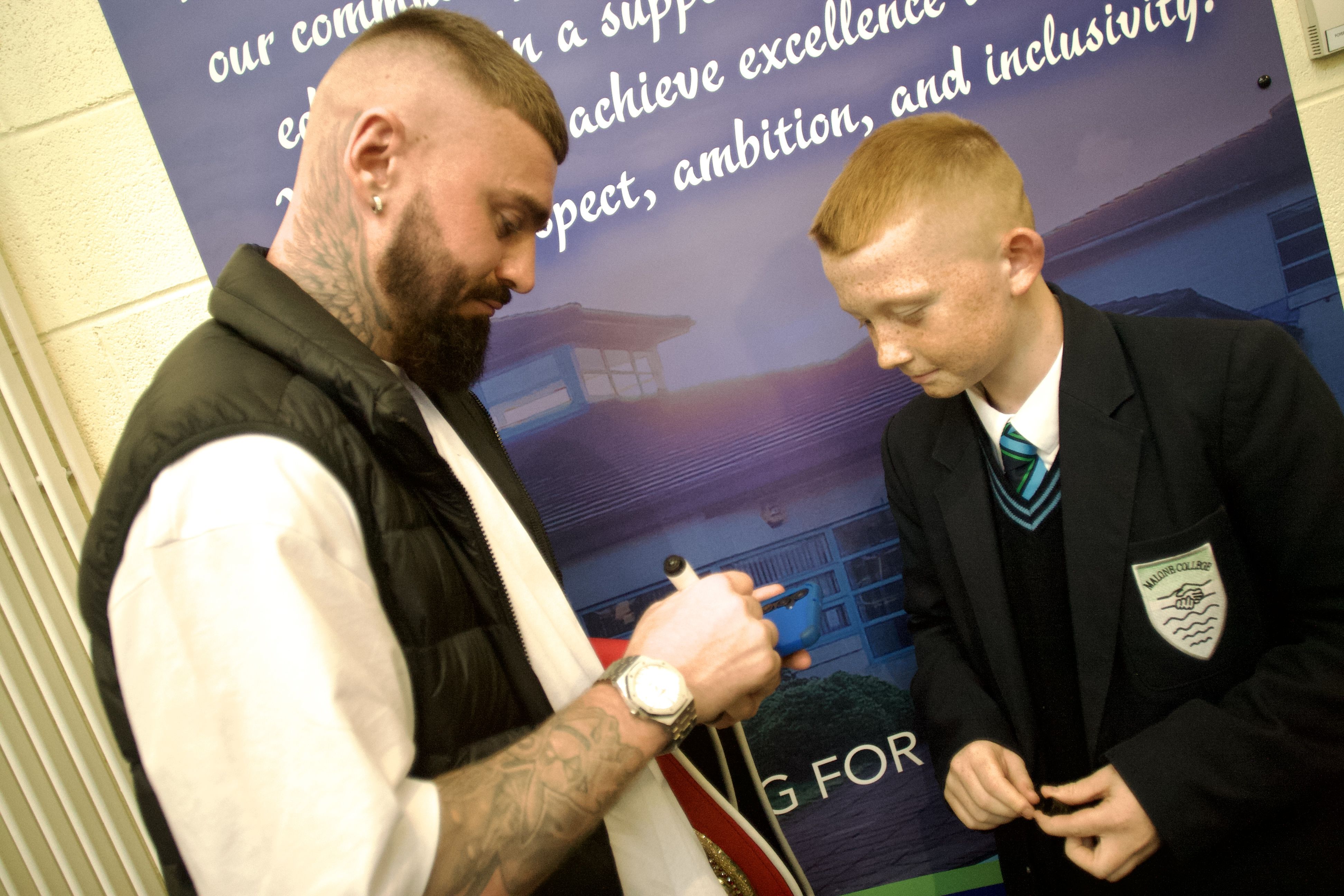 Lewis signed autographs on his return visit