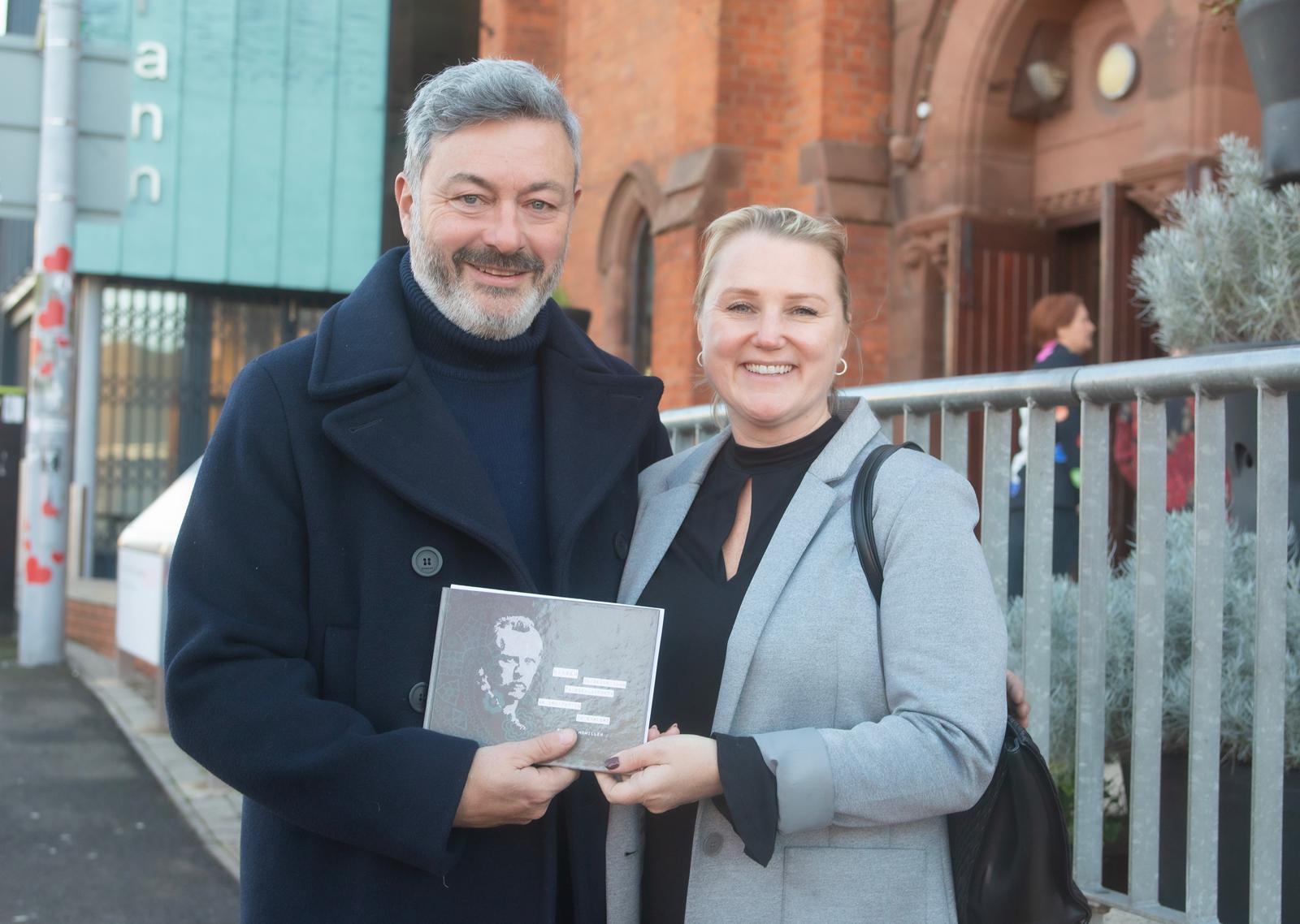 BUSINESS BRIEF: Pete Boyle, guest speaker at the West roundtable, receives a gift of the story of Norweigian explorer Fridtjof Nansen, after whom Nansen Street was named, from Connla McCann of Aisling.