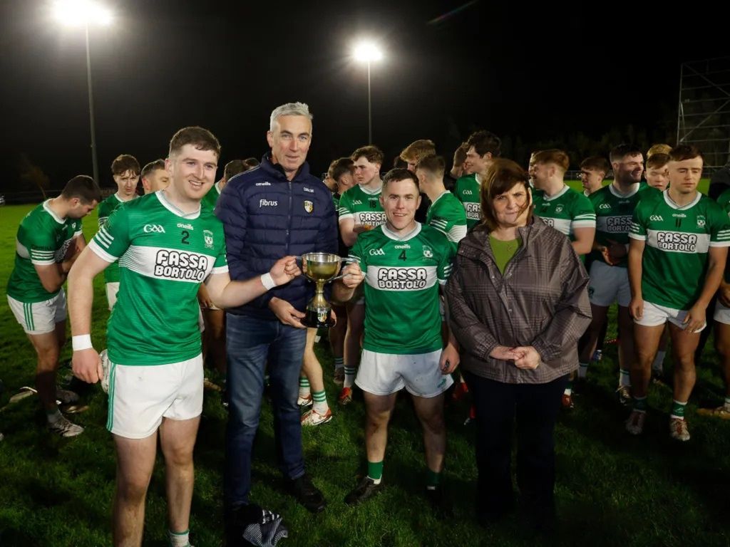 County chairman Seamus McMullan and Maria Toner of Casement Social Club with joint captains Eoin McCusker and Brian O’Neill