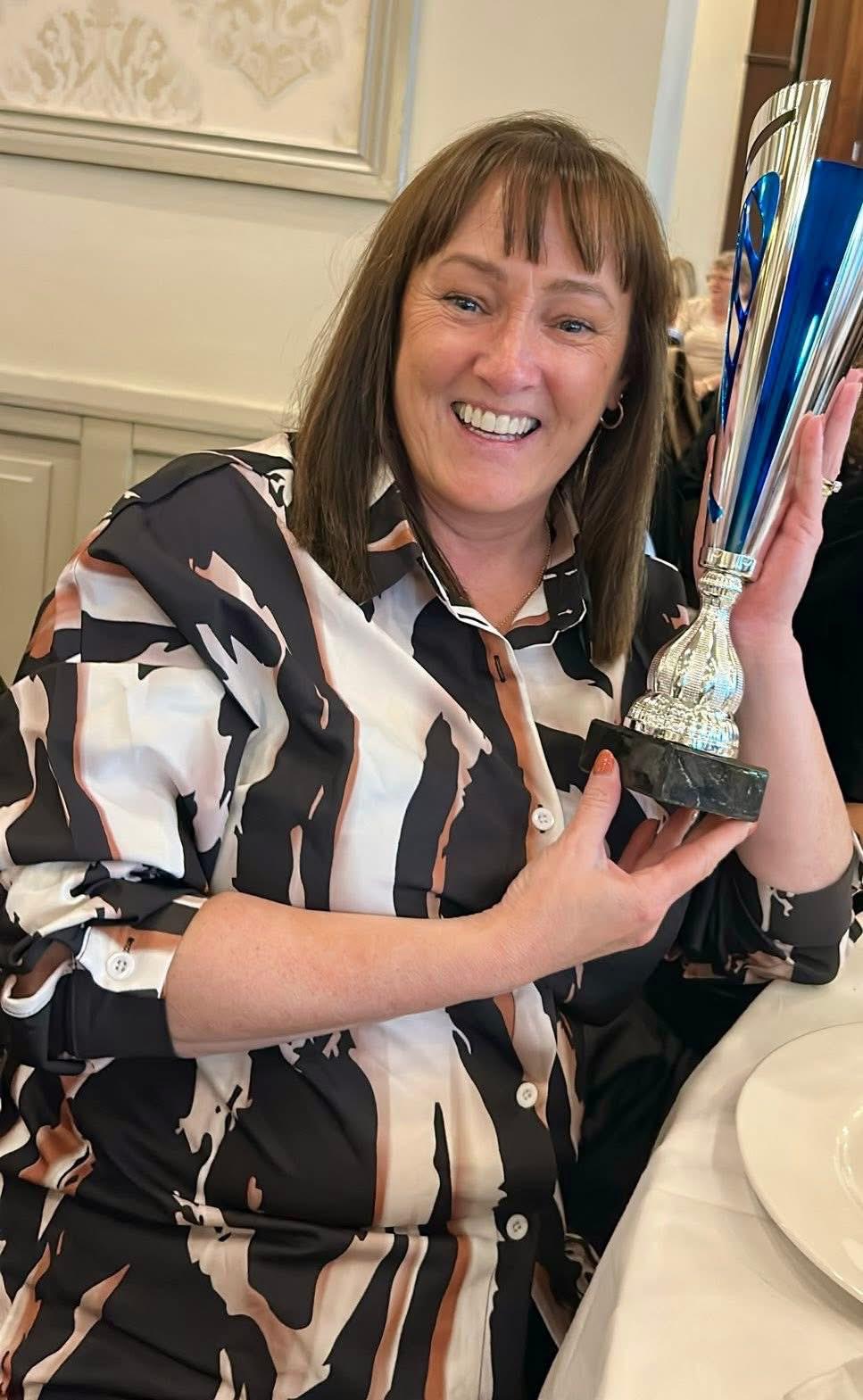 SAG's Paula Quinn with the much sought-after trophy