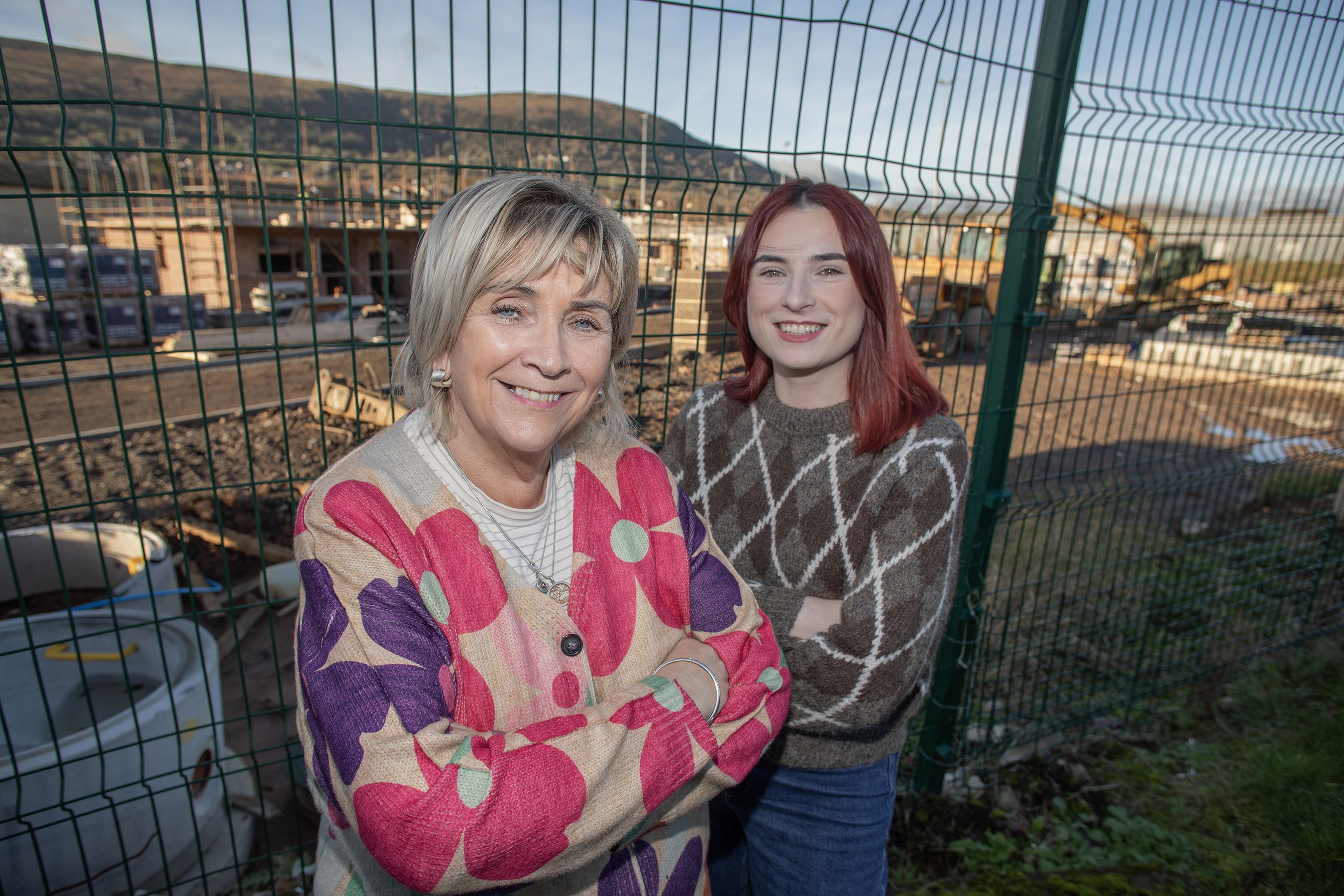 Deirdre Walsh and Councillor Róis-Máire Donnelly at the site of the new build