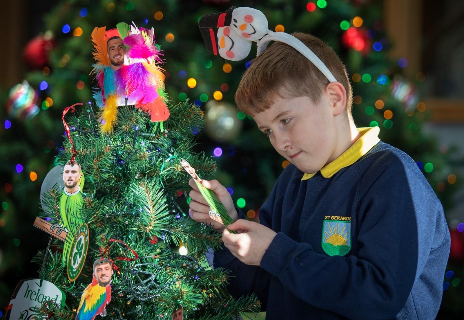 Ché Copeland gazes upon a cut-out of Troy Parrott 