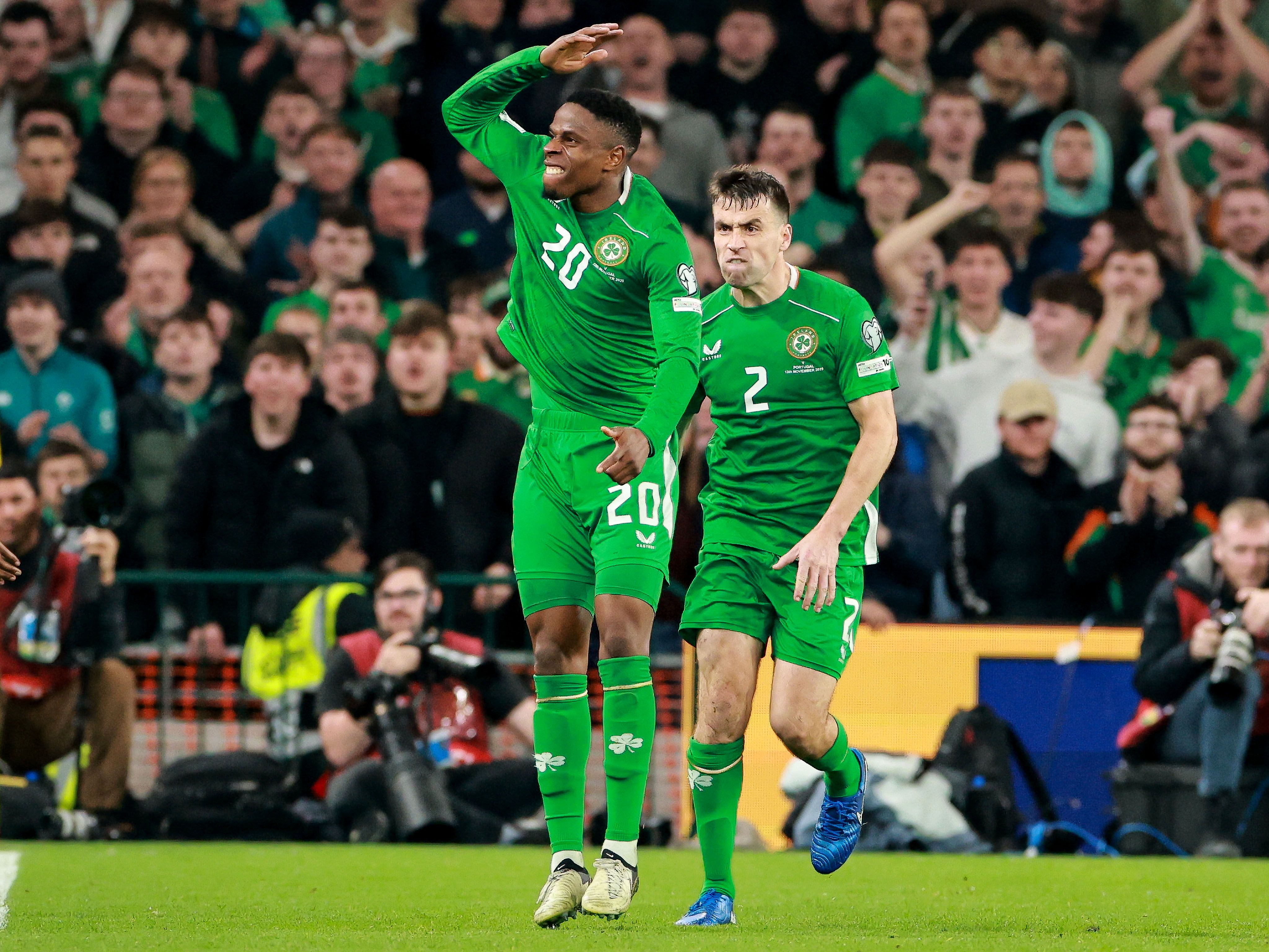 Ogbene and Coleman celebrate after the full-time whistle