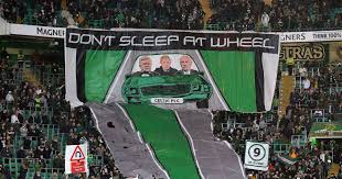 A Green Brigade banner from 2019 calling the board out for lack of transfers
