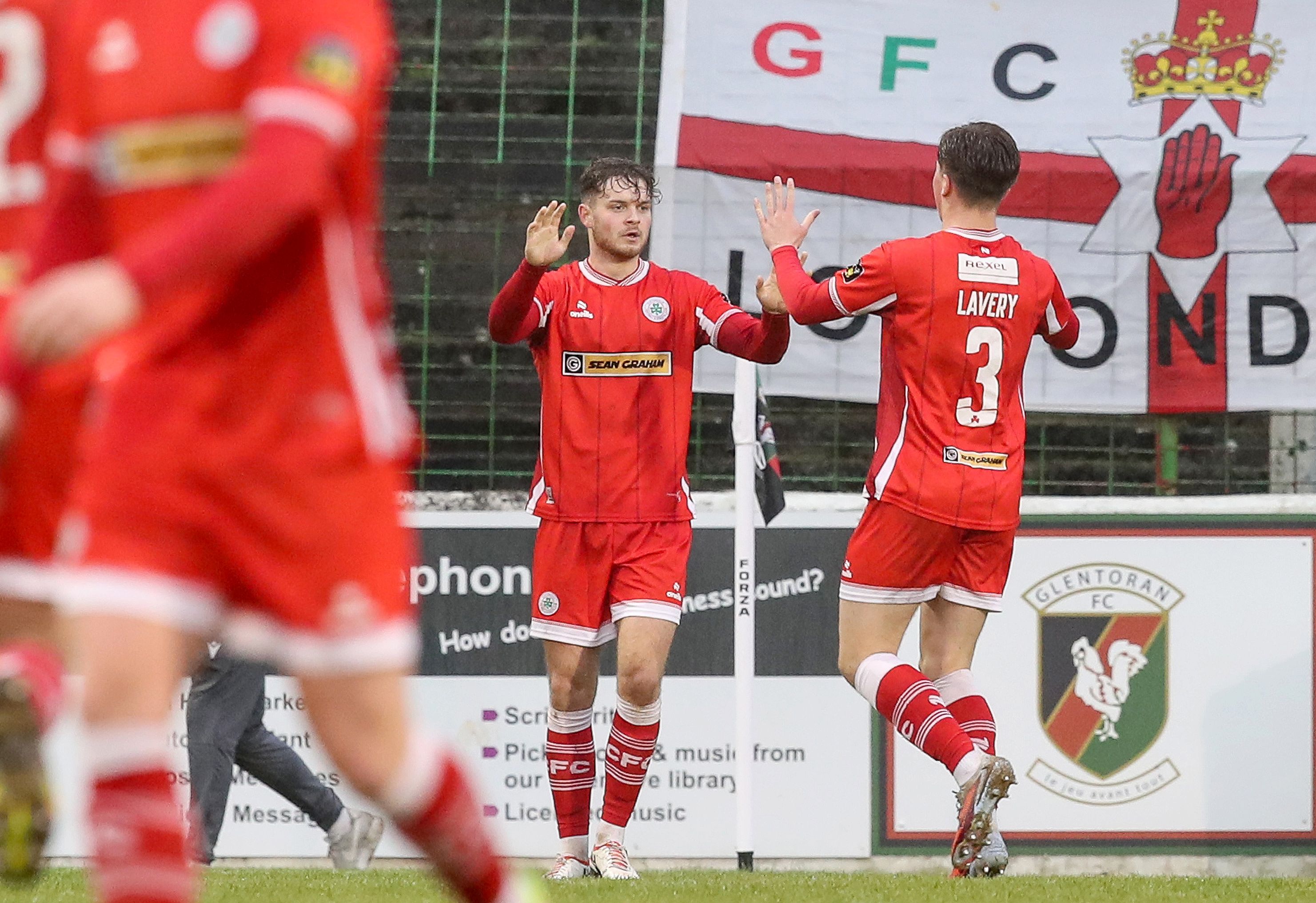 Tom Lavery celebrates his first half goal for the Reds