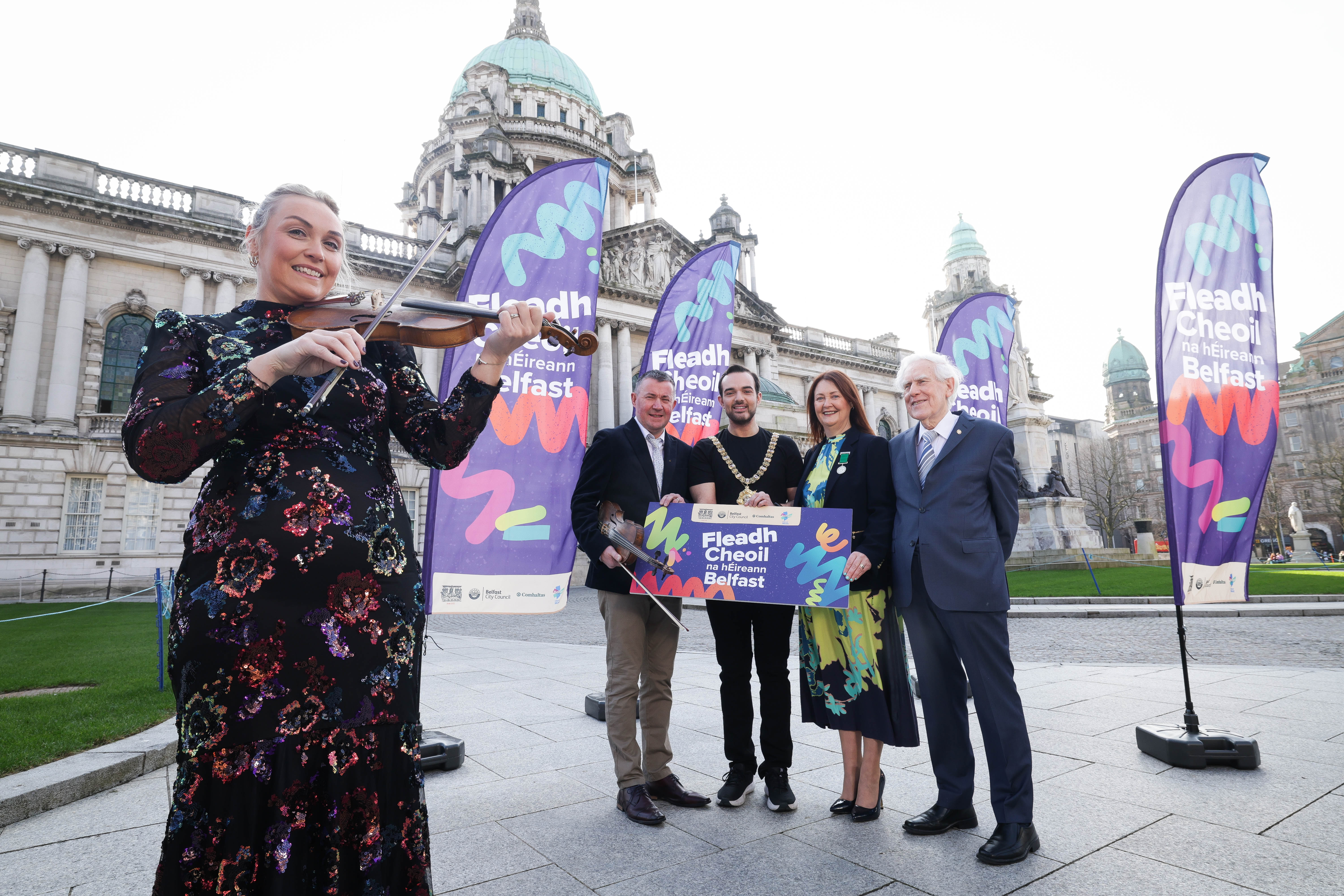 Bronagh McClean and Niall McClean from Ards CCE, Lord Mayor of Belfast, Micky Murray, Attracta Bradyand Labhrás Ó Murchú from Comhaltas pictured at Belfast City Hall