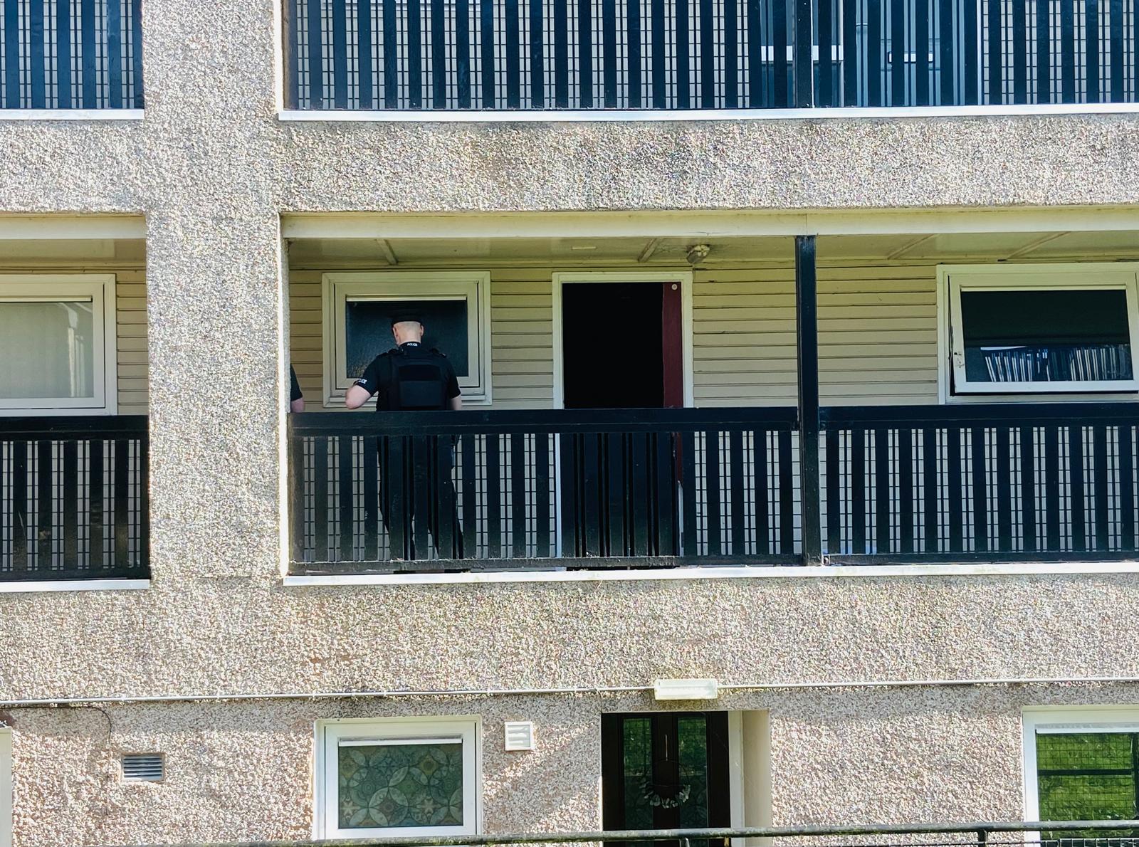 Police at the scene of the blaze on Monday