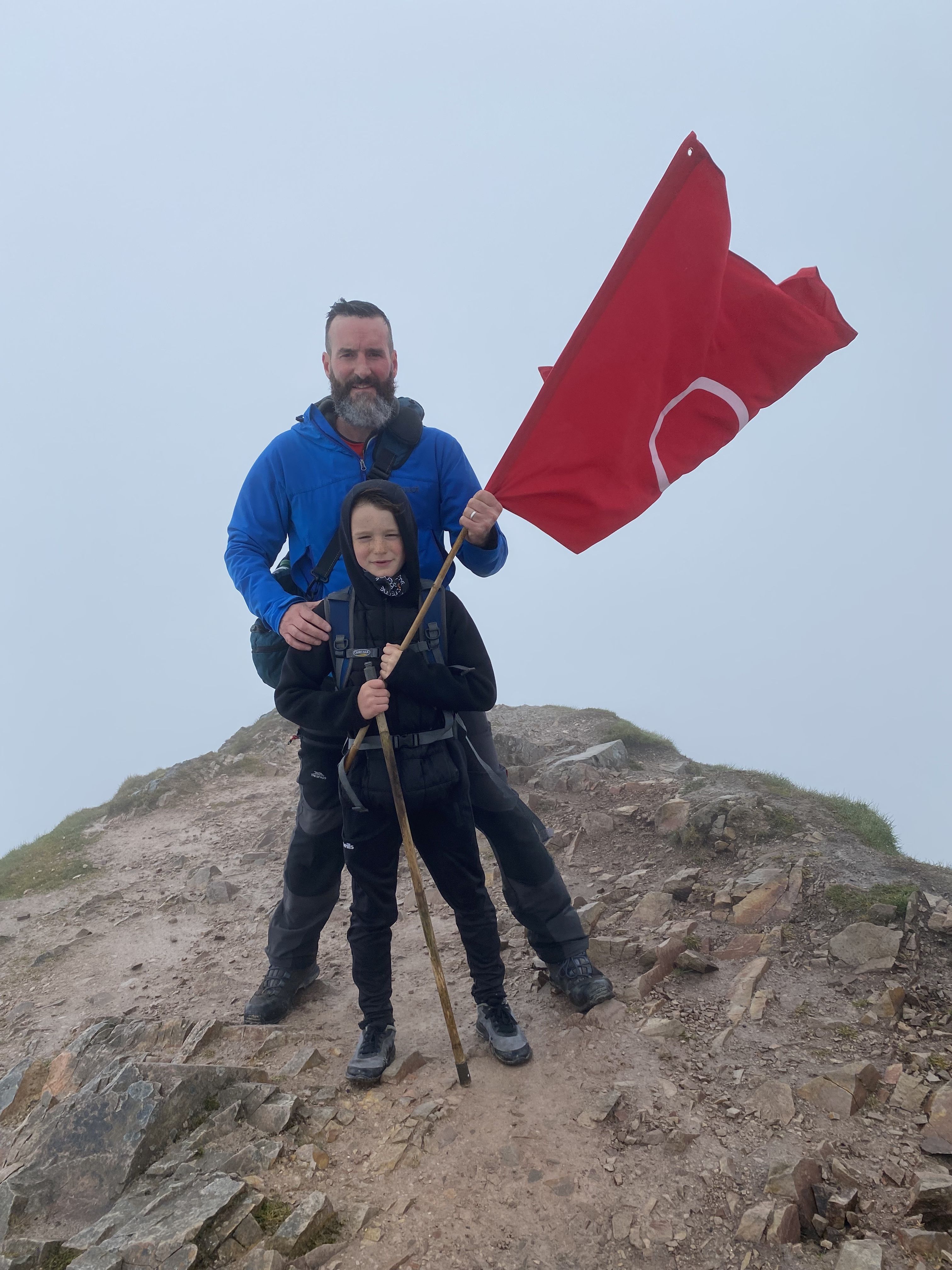 DEARG LE FEARG: Raising the flag for Irish language rights at the top of Errigal 