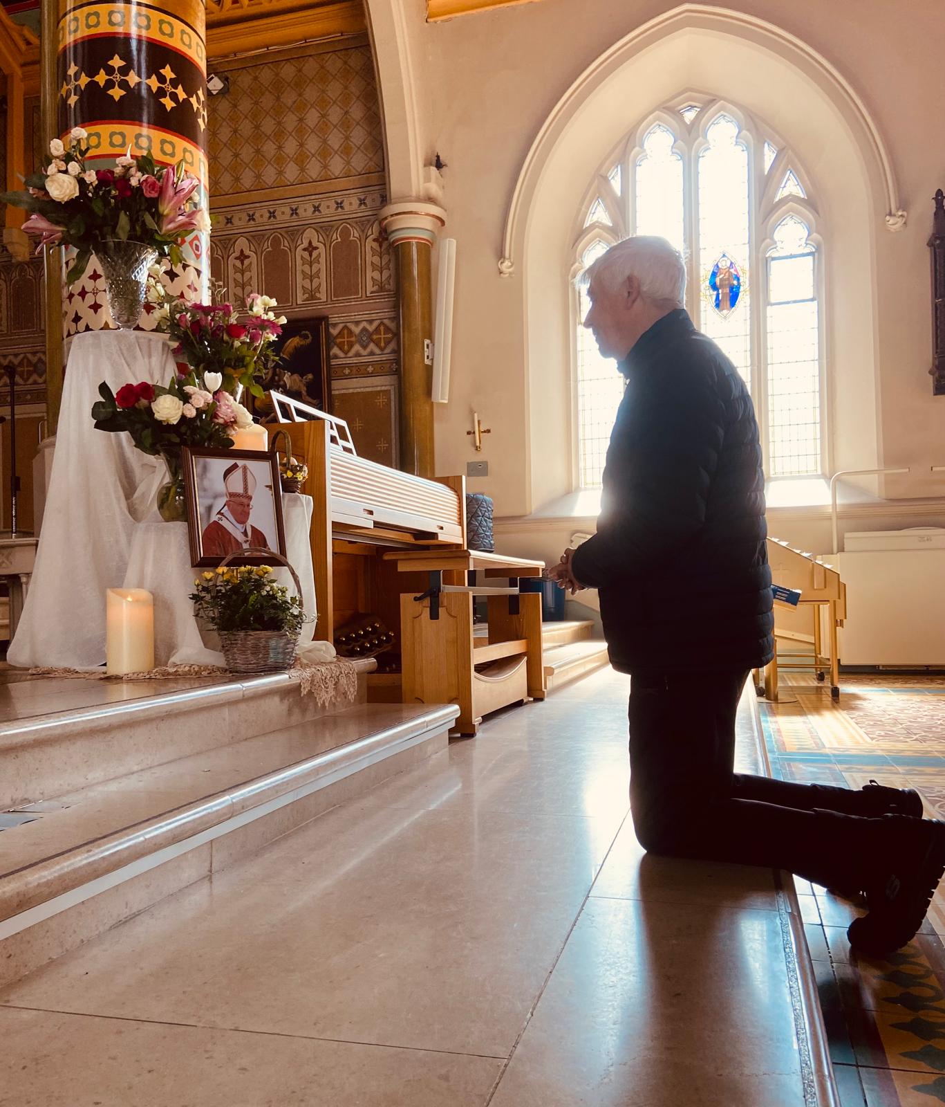Jim McKee prays for Pope Francis at St Peter's Cathedral