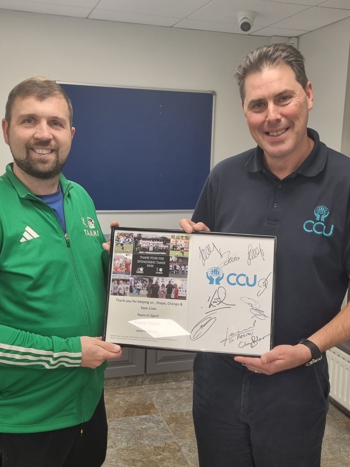 0f8f02b0-6d7b-43fb-bd91-2ee1e6b0a5ea.jpeg T.A.M.H.I’s Joe Donnelly gifts CCU memorabilia from a sponsored event